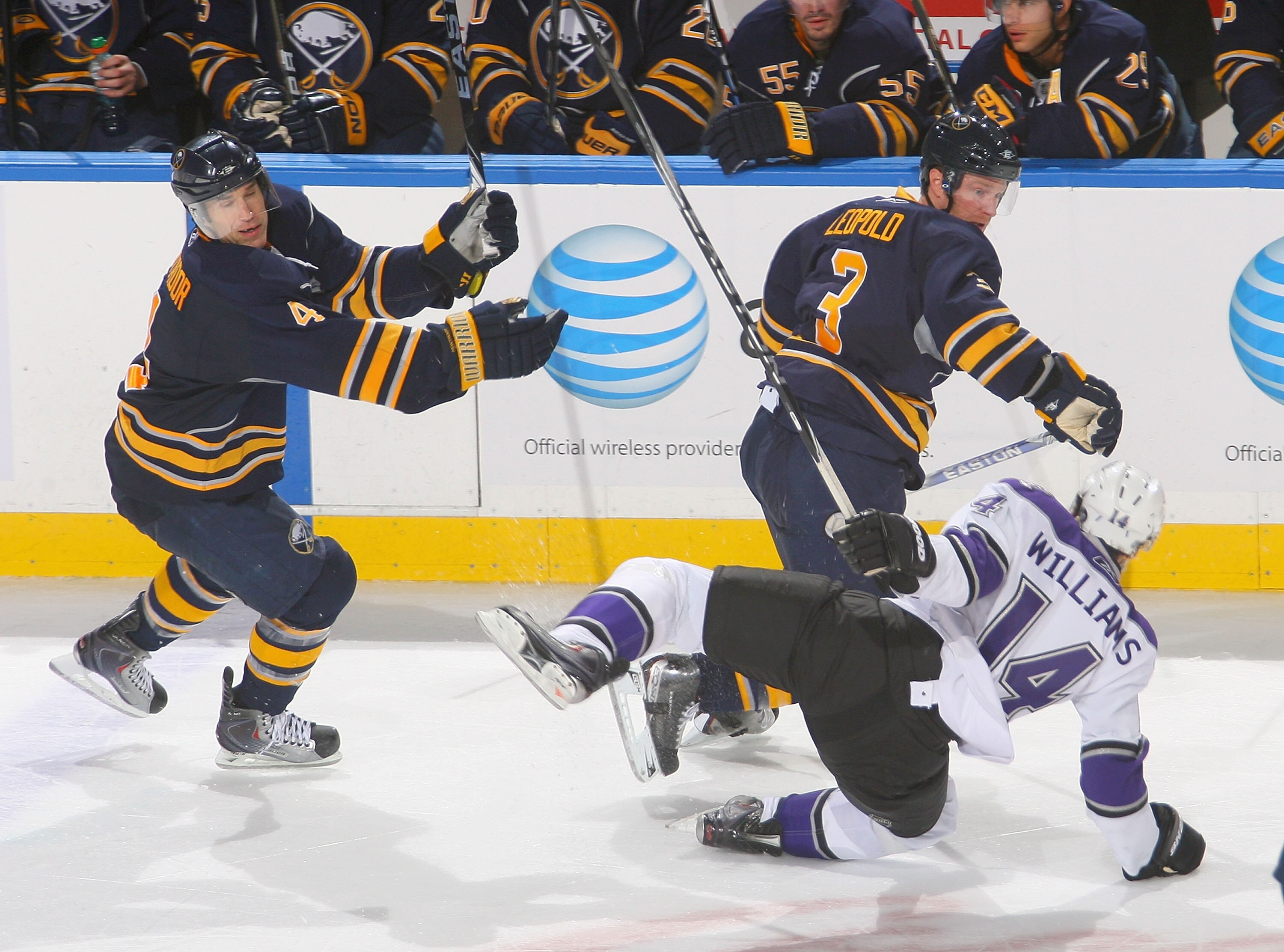 BUFFALO, NY - NOVEMBER 19: Steve Montador #4 and Jordan Leopold #3 of the Buffalo Sabres skate against Justin Williams #14 of the Los Angeles Kings at HSBC Arena on November 19, 2010 in Buffalo, New York. Buffalo won 4-2.  (Photo by Rick Stewart/Getty Ima