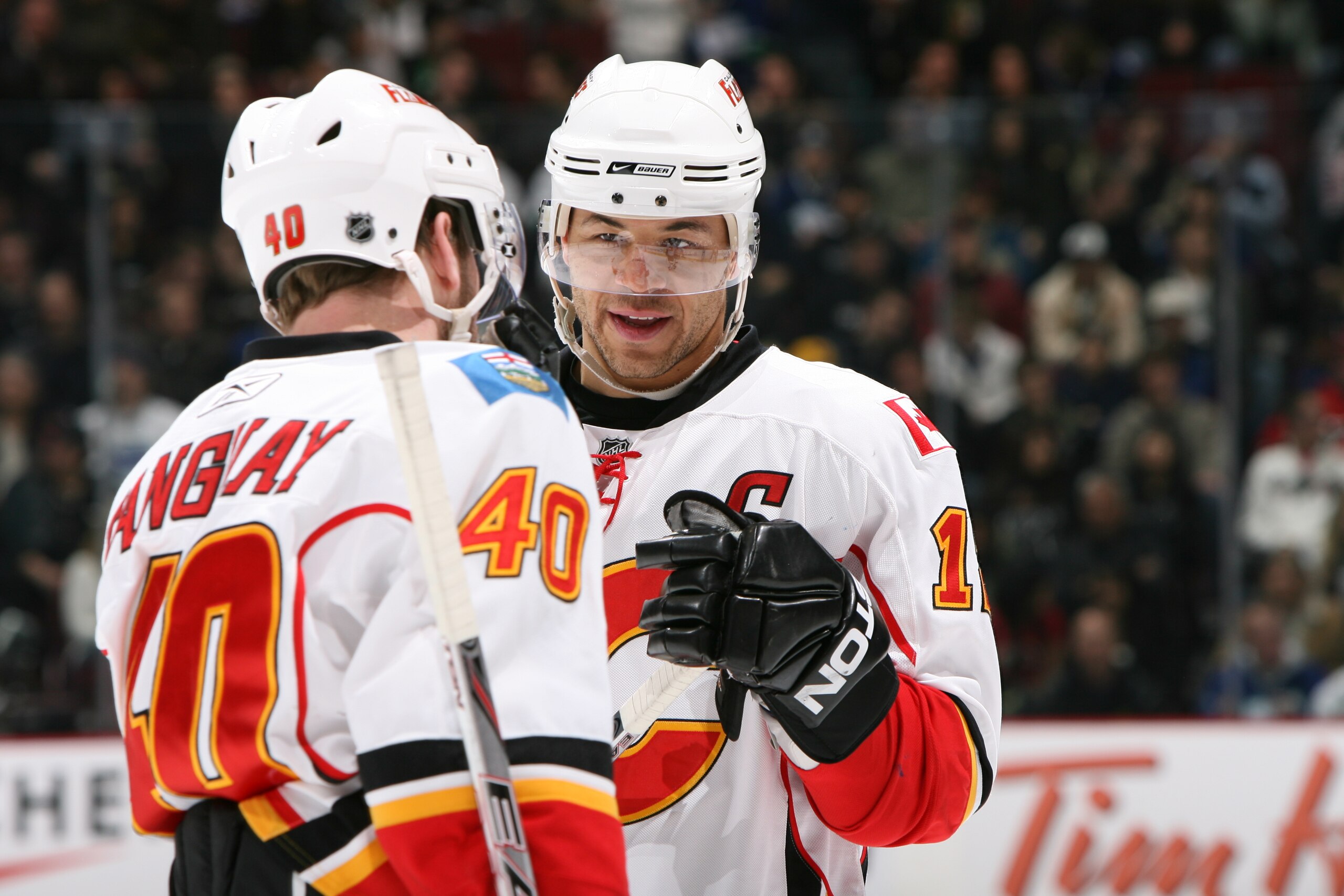 VANCOUVER, CANADA - MARCH 30: Jarome Iginla #12, captain of the Calgary Flames, confers with teammate Alex Tanguay #40 during the game against the Vancouver Canucks at General Motors Place on March 30, 2008 in Vancouver, Canada. (Photo by Kim Stallkne VANCOUVER, CANADA - MARCH 30: Jarome Iginla #12, captain of the Calgary Flames, confers with teammate Alex Tanguay #40 during the game against the Vancouver Canucks at General Motors Place on March 30, 2008 in Vancouver, Canada. (Photo by Kim Stallkne