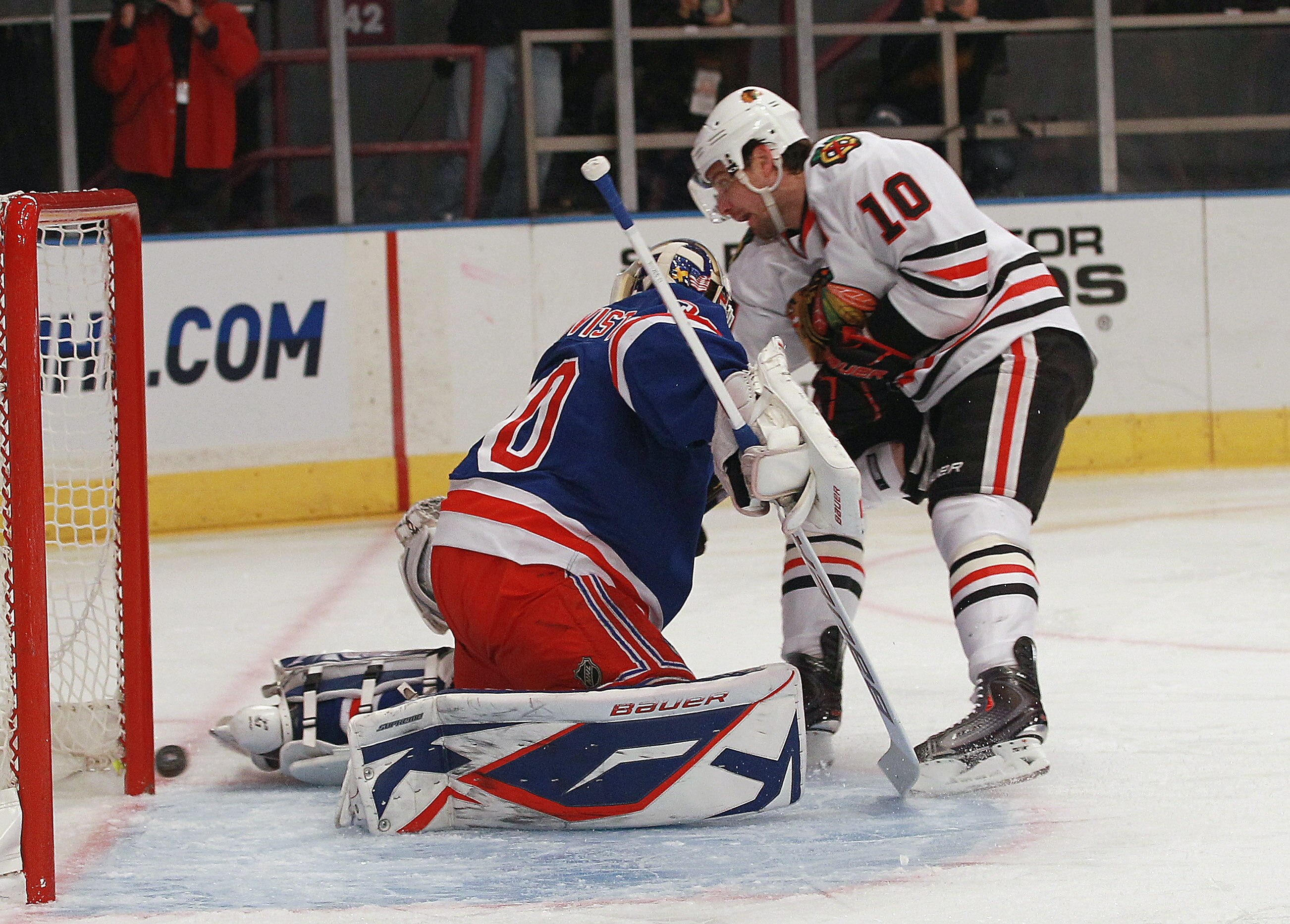 NEW YORK - NOVEMBER 01: Patrick Sharp #10 of the Chicago Blackhawks is stopped by Henrik Lundqvist #30 of the New York Rangers at Madison Square Garden on November 1, 2010 in New York City.  (Photo by Bruce Bennett/Getty Images)