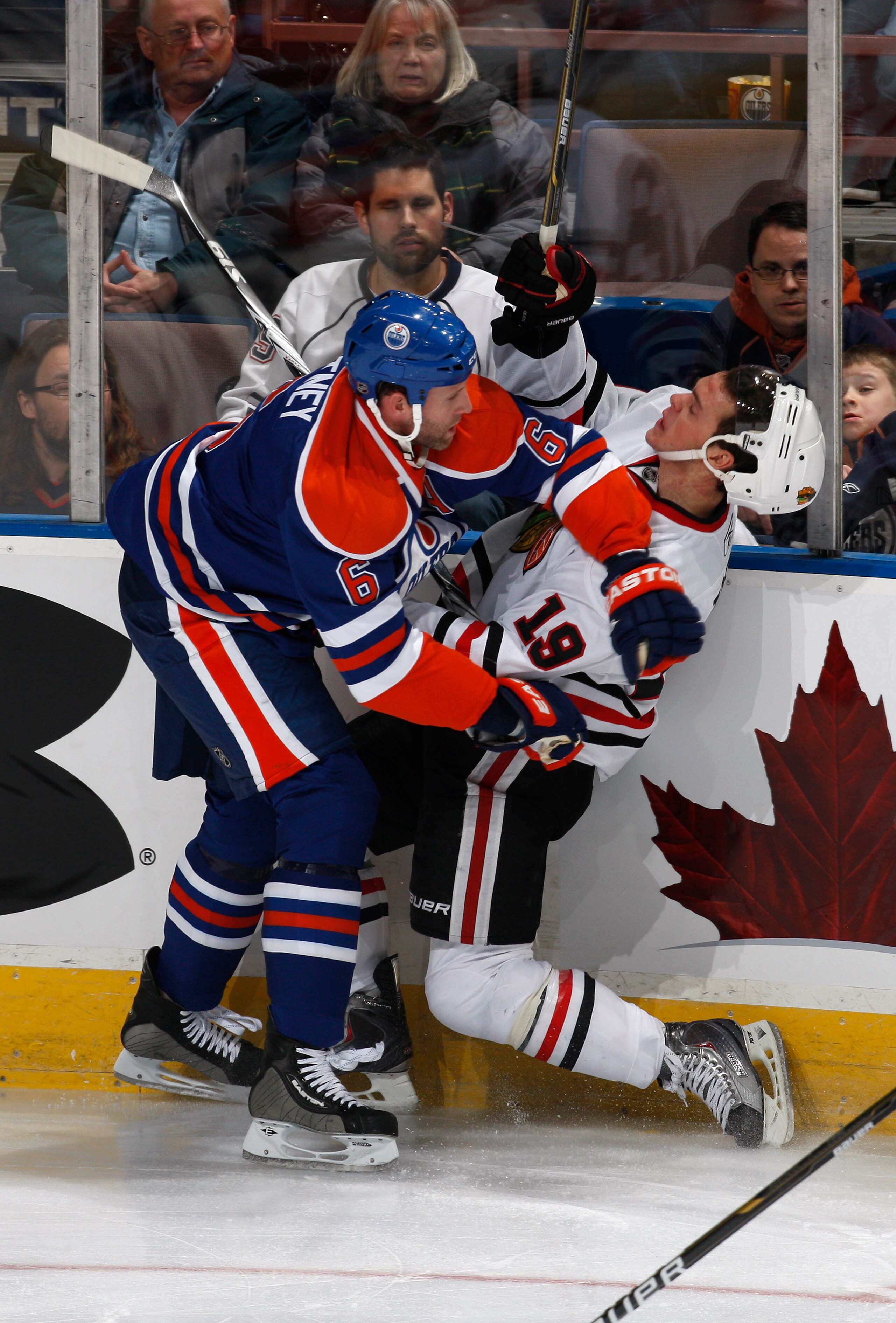 EDMONTON, CANADA - NOVEMBER 17: Ryan Whitney #6 of the Edmonton Oilers checks Jonathan Toews #19 of the Chicago Blackhawks in first-period action at Rexall Place November 5, 2010 in Edmonton, Alberta, Canada. (Photo by Dale MacMillan/Getty Images) EDMONTON, CANADA - NOVEMBER 17: Ryan Whitney #6 of the Edmonton Oilers checks Jonathan Toews #19 of the Chicago Blackhawks in first-period action at Rexall Place November 5, 2010 in Edmonton, Alberta, Canada. (Photo by Dale MacMillan/Getty Images)