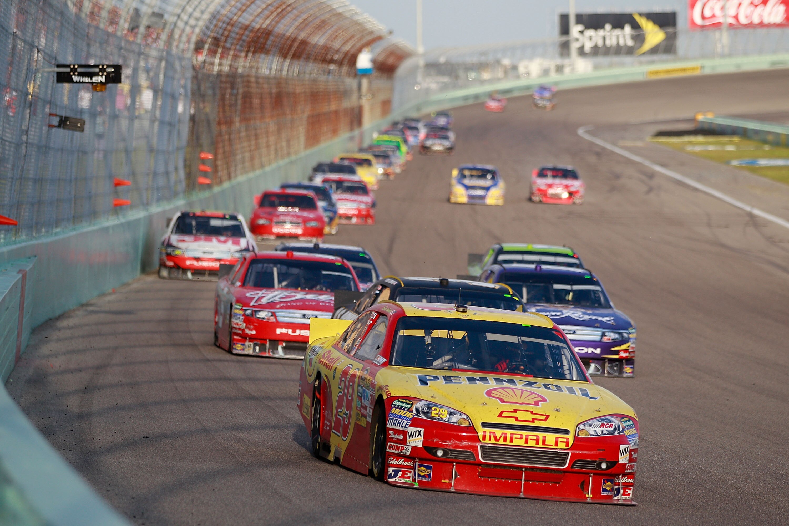 HOMESTEAD, FL - NOVEMBER 21:  Kevin Harvick, driver of the #29 Shell/Pennzoil Chevrolet, leads a line of cars during the NASCAR Sprint Cup Series Ford 400 at Homestead-Miami Speedway on November 21, 2010 in Homestead, Florida.  (Photo by Chris Graythen/Ge