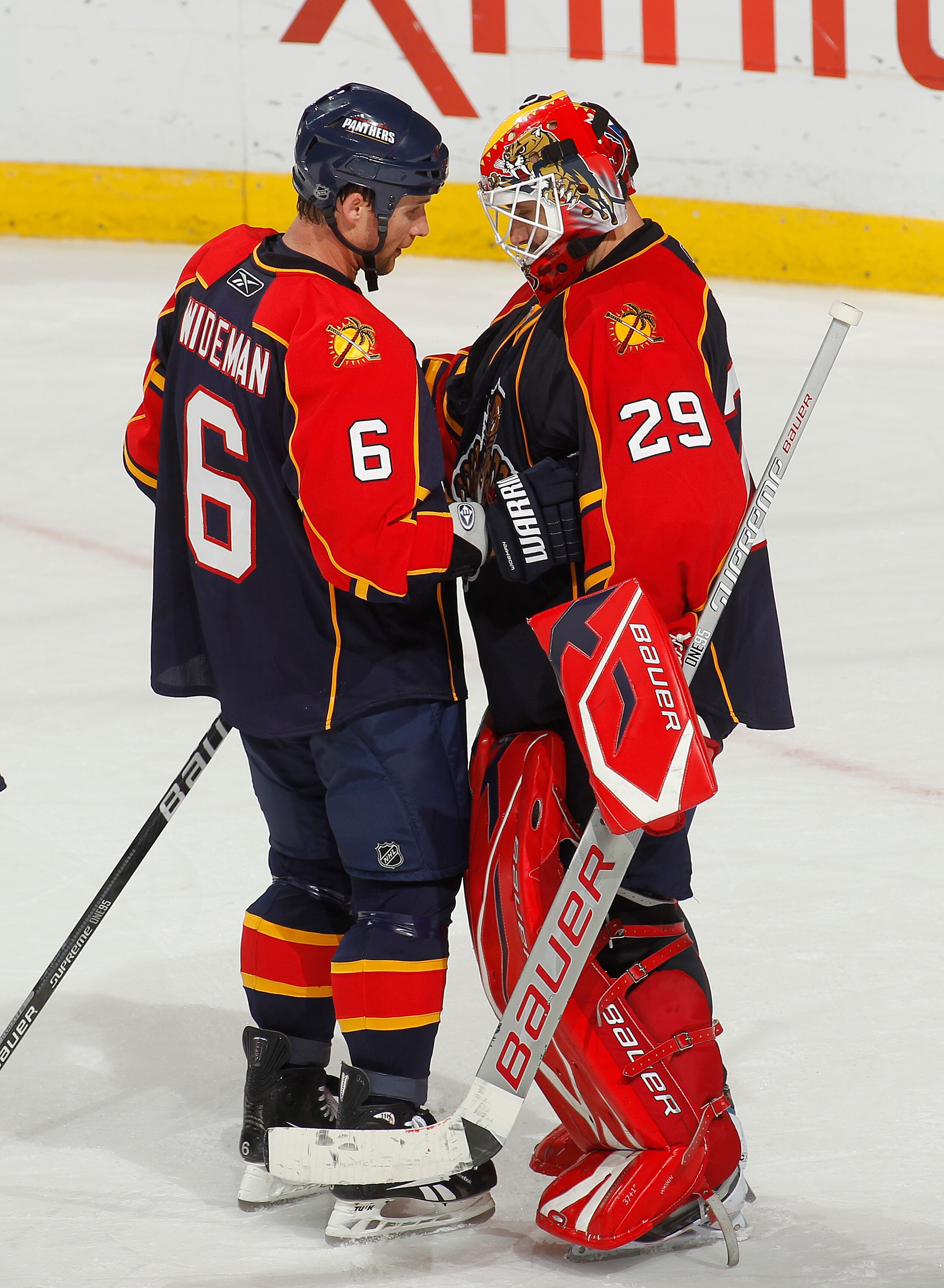 SUNRISE, FL - NOVEMBER 10: Goaltender Tomas Vokoun #29 of the Florida Panthers is congratulated by teammate Dennis Wideman #6 after defeating the Toronto Maple Leafs 4-1 on November 10, 2010 at the BankAtlantic Center in Sunrise, Florida. (Photo by Joel A