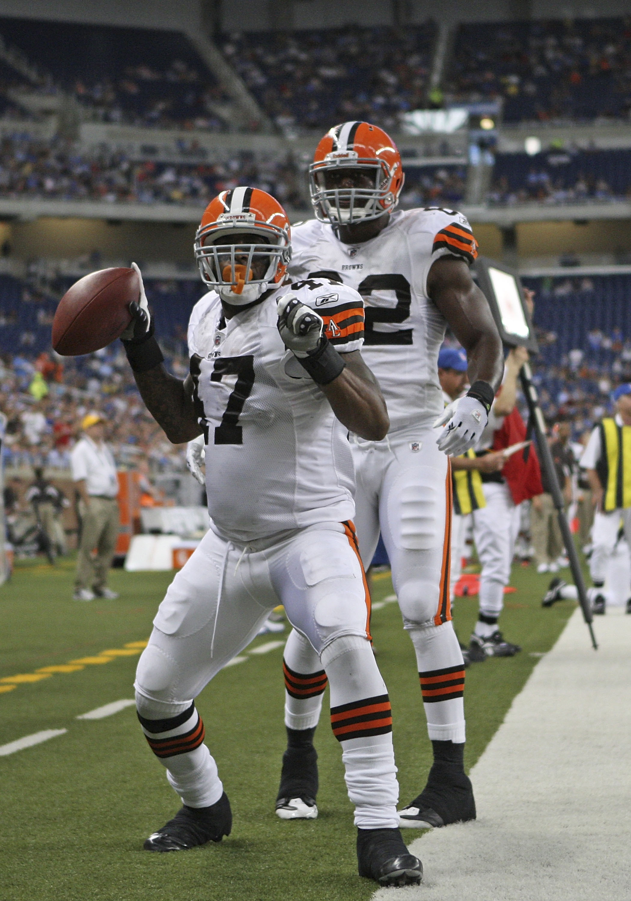 DETROIT - AUGUST 28: Lawrence Vickers #47 of the Cleveland Browns scores a second quarter touchdown against the Detroit Lions as teammate Benjamin Watson #82 joins the celebration during the preseason game at Ford Field on August 28, 2010 in Detroit, Mich