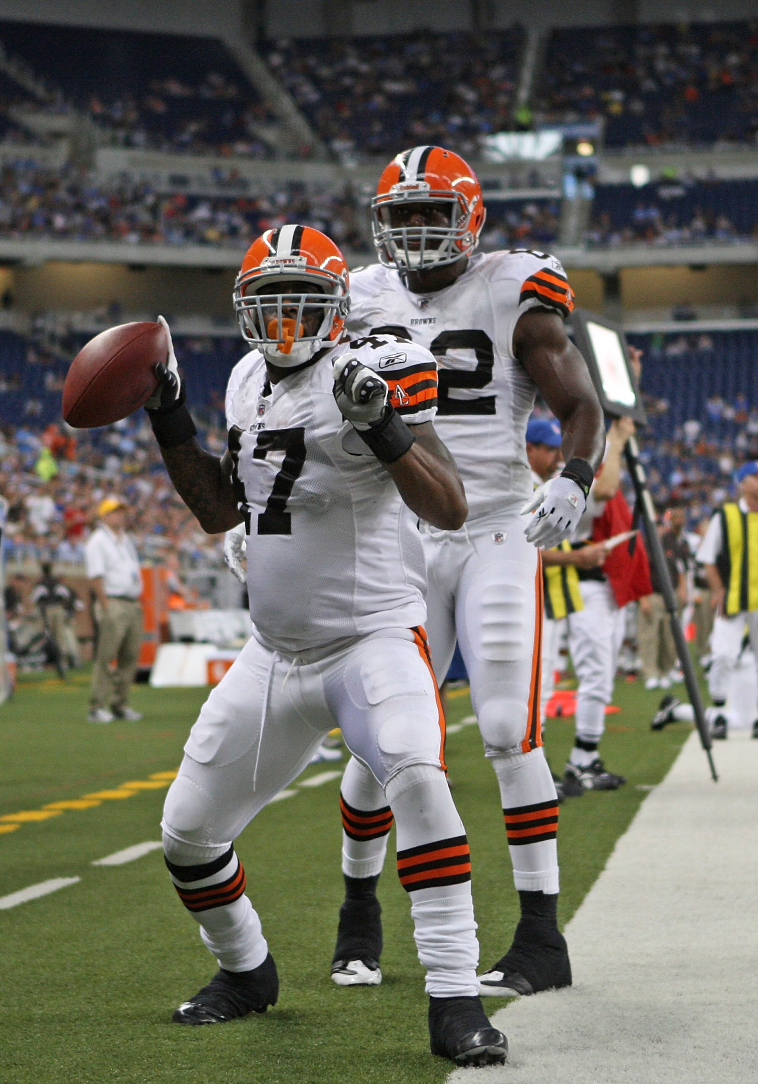 DETROIT - AUGUST 28: Lawrence Vickers #47 of the Cleveland Browns scores a second quarter touchdown against the Detroit Lions as teammate Benjamin Watson #82 joins the celebration during the preseason game at Ford Field on August 28, 2010 in Detroit, Mich