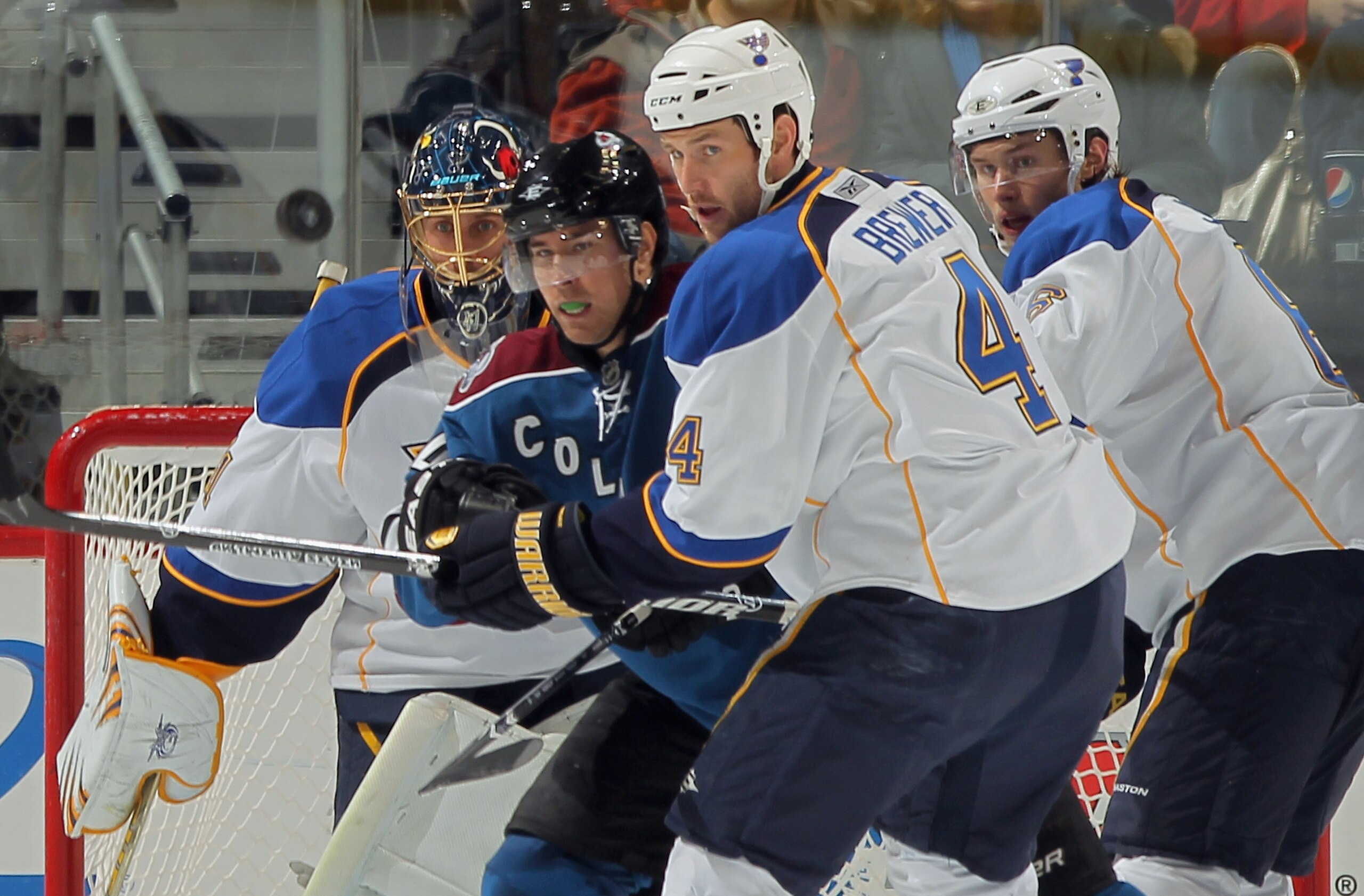 DENVER - NOVEMBER 15: Goalie Jaroslav Halak #41 of the St. Louis Blues defends the goal as Daniel Winnik #34 of the Colorado Avalanche, Eric Brewer #4 and Erik Johnson #6 of the Blues keep their eyes on the puck at the Pepsi Center on November 15, 2010 i DENVER - NOVEMBER 15: Goalie Jaroslav Halak #41 of the St. Louis Blues defends the goal as Daniel Winnik #34 of the Colorado Avalanche, Eric Brewer #4 and Erik Johnson #6 of the Blues keep their eyes on the puck at the Pepsi Center on November 15, 2010 i