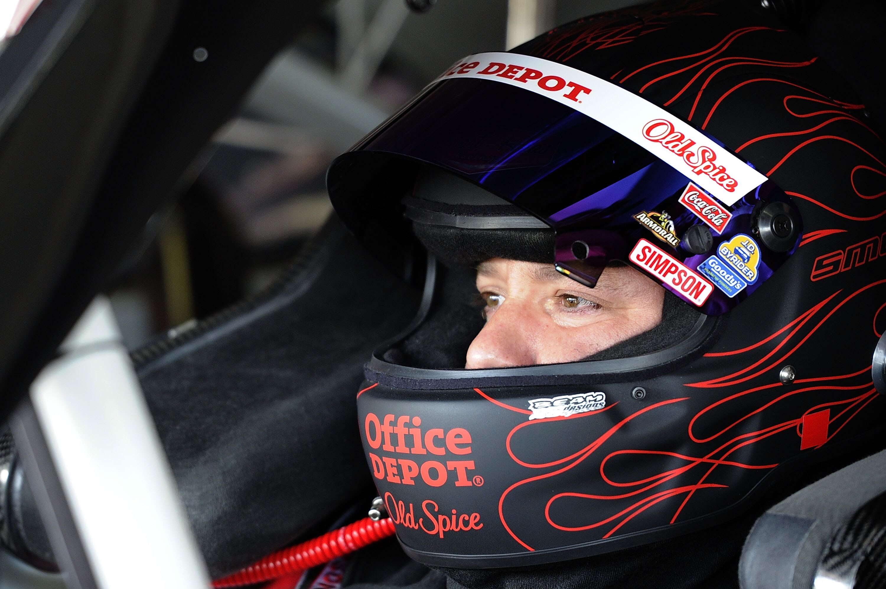 HOMESTEAD, FL - NOVEMBER 20:  Tony Stewart, driver of the #14 Old Spice/Office Depot Chevrolet, sits in his car during practice for the NASCAR Sprint Cup Series Ford 400 at Homestead-Miami Speedway on November 20, 2010 in Homestead, Florida.  (Photo by Jo