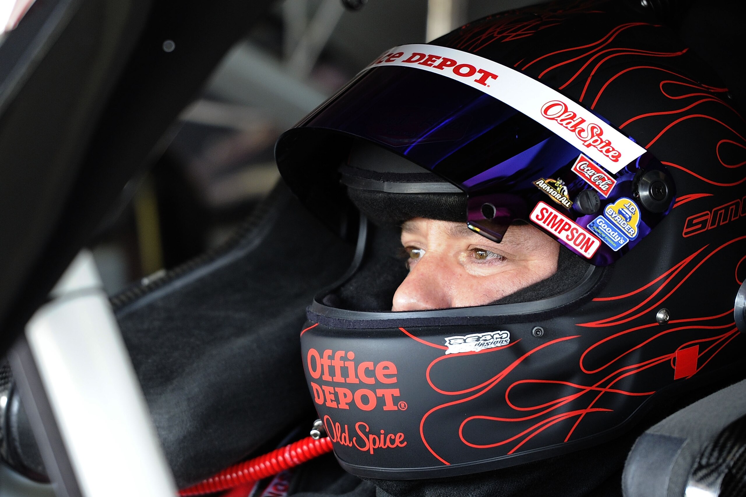 HOMESTEAD, FL - NOVEMBER 20:  Tony Stewart, driver of the #14 Old Spice/Office Depot Chevrolet, sits in his car during practice for the NASCAR Sprint Cup Series Ford 400 at Homestead-Miami Speedway on November 20, 2010 in Homestead, Florida.  (Photo by Jo