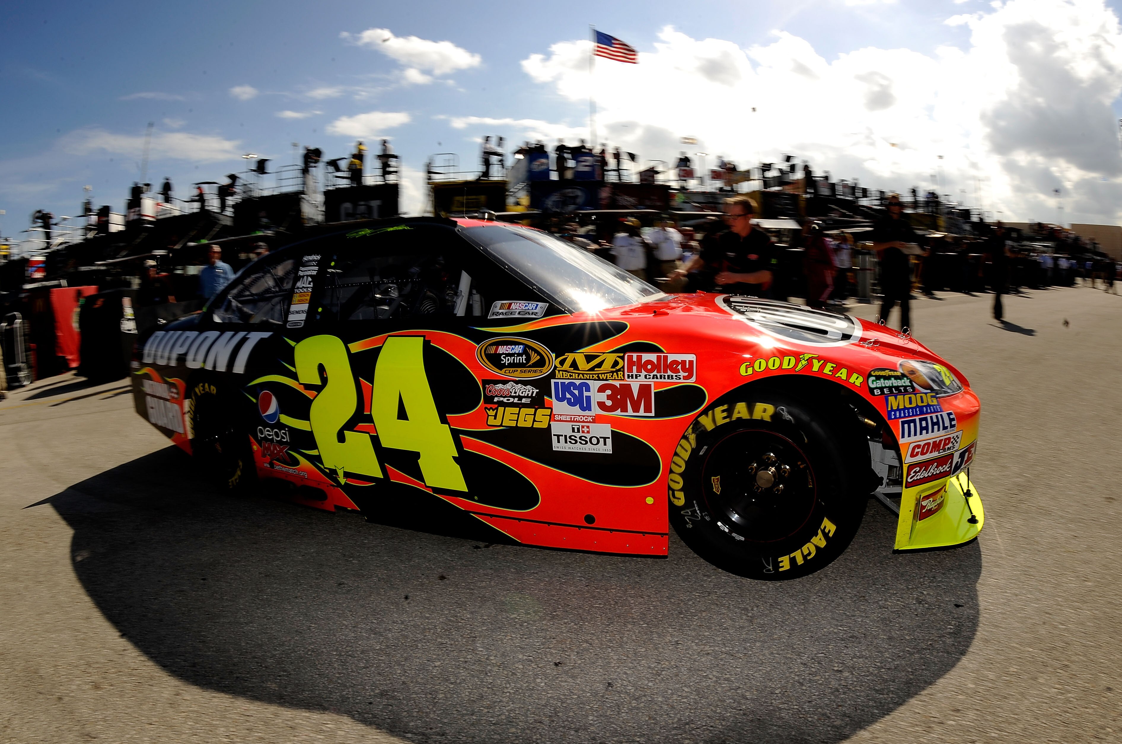 HOMESTEAD, FL - NOVEMBER 20:  Jeff Gordon drives the #24 DuPont Chevrolet through the garage area during practice for the NASCAR Sprint Cup Series Ford 400 at Homestead-Miami Speedway on November 20, 2010 in Homestead, Florida.  (Photo by Rusty Jarrett/Ge