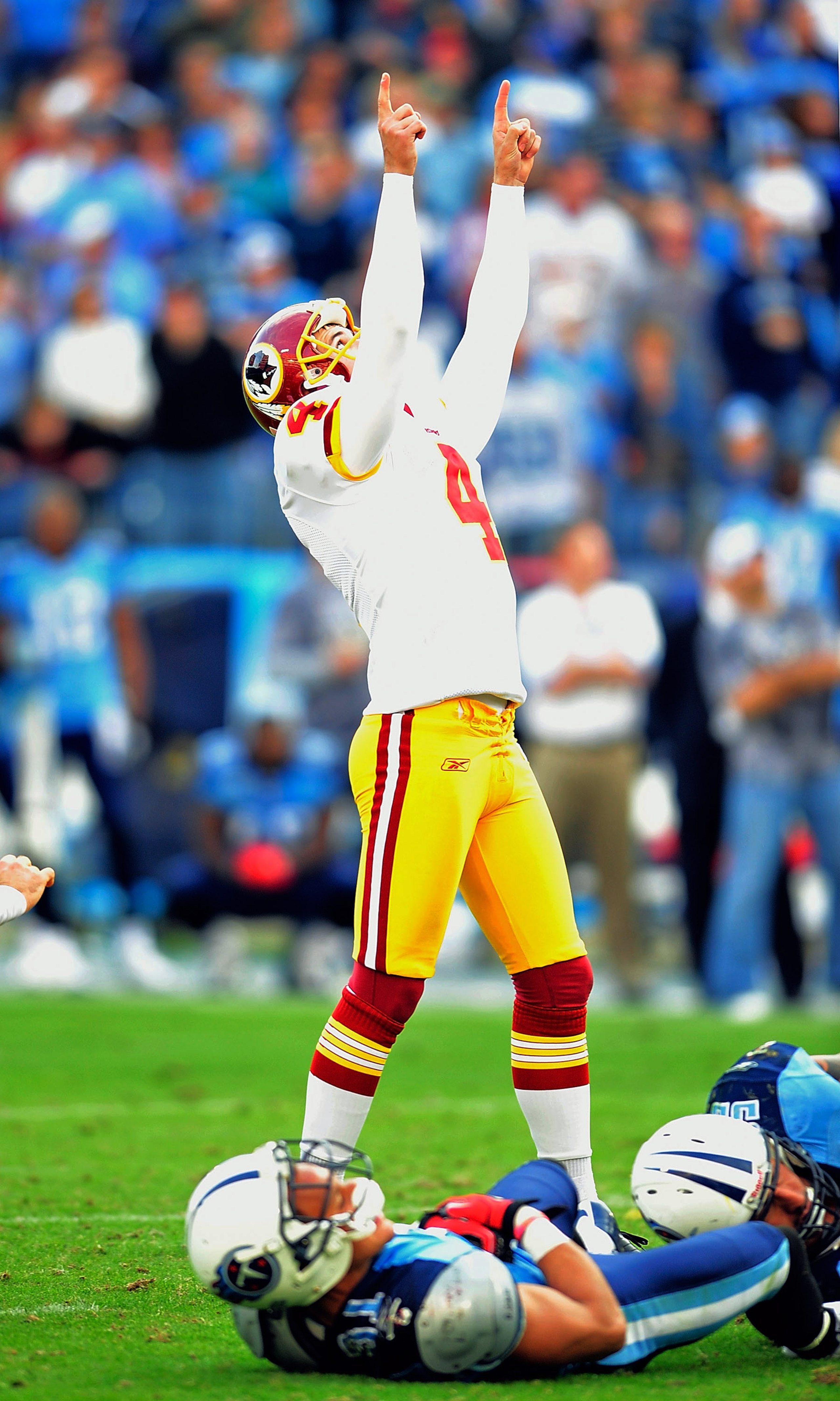 NASHVILLE, TN - NOVEMBER 21:  Graham Gano #4 of the Washington Redskins reacts to his game-winning field goal against the Tennessee Titans at LP Field on November 21, 2010 in Nashville, Tennessee. The Redskins won 19-16 in overtime.  (Photo by Grant Halve