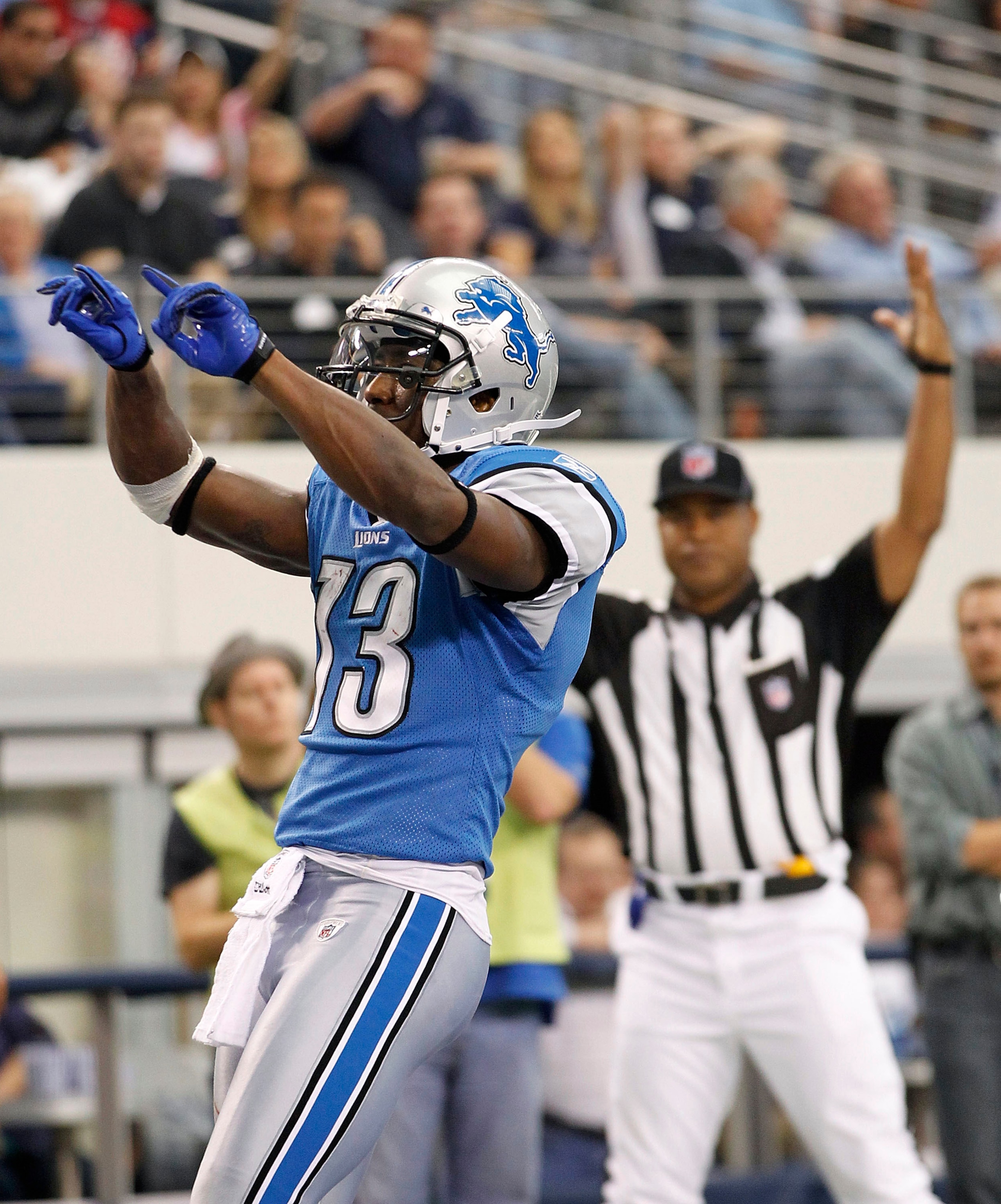 ARLINGTON, TX - NOVEMBER 21: Nate Burleson #13 of the Detroit Lions scores a late second quarter touchdown against the Dallas Cowboys at Dallas Stadium on November 21, 2010 in Arlington, Texas. (Photo by Leon Halip/Getty Images) ARLINGTON, TX - NOVEMBER 21: Nate Burleson #13 of the Detroit Lions scores a late second quarter touchdown against the Dallas Cowboys at Dallas Stadium on November 21, 2010 in Arlington, Texas. (Photo by Leon Halip/Getty Images)