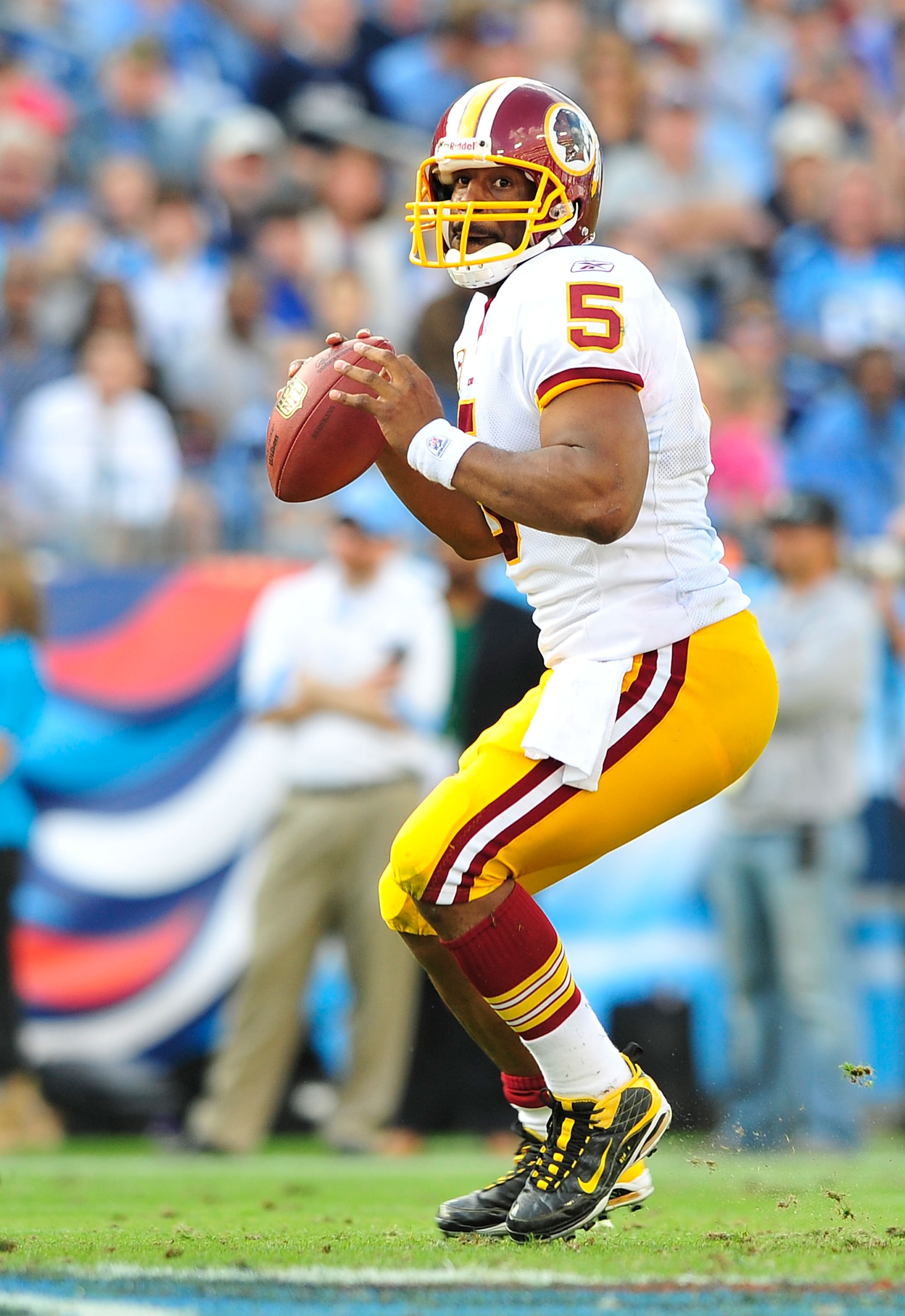 NASHVILLE, TN - NOVEMBER 21: Quarterback Donovan McNabb #5 of the Washington Redskins drops back to pass against the Tennessee Titans at LP Field on November 21, 2010 in Nashville, Tennessee. The Redskins won 19-16 in overtime. (Photo by Grant Halverson NASHVILLE, TN - NOVEMBER 21: Quarterback Donovan McNabb #5 of the Washington Redskins drops back to pass against the Tennessee Titans at LP Field on November 21, 2010 in Nashville, Tennessee. The Redskins won 19-16 in overtime. (Photo by Grant Halverson