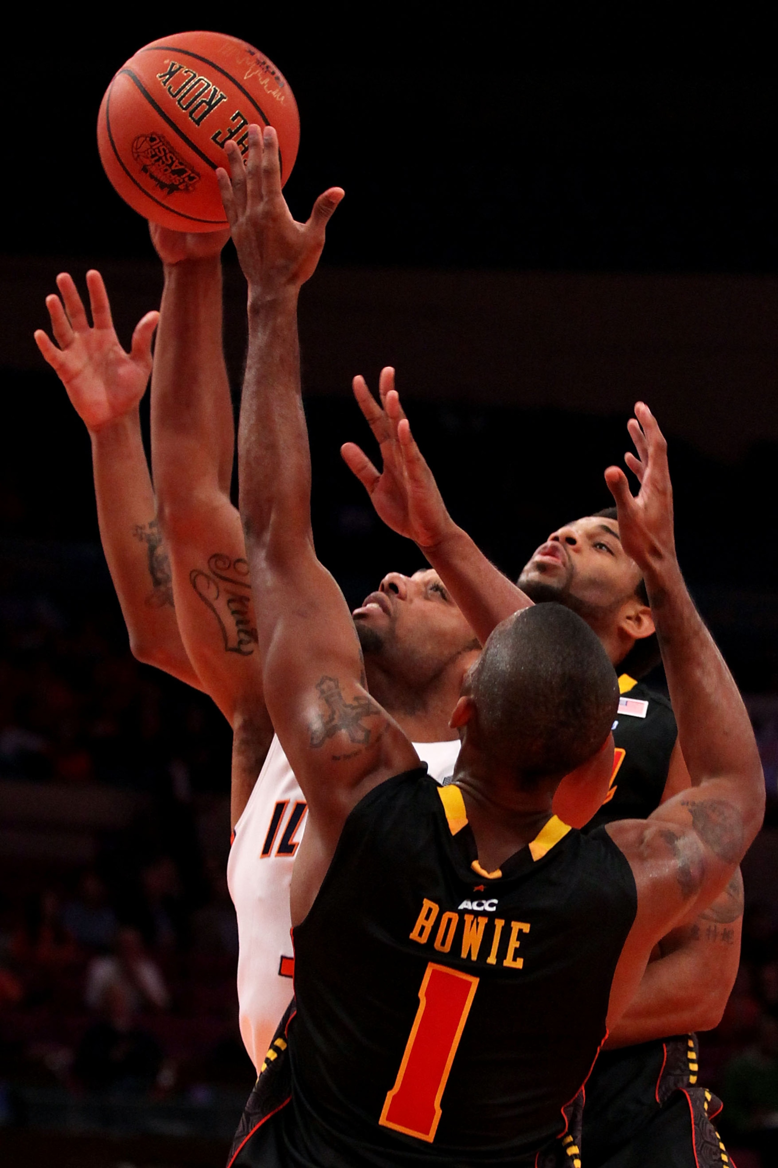 NEW YORK - NOVEMBER 19:  Demetri McCamey #32 of the Illinois Fighting Illini grabs a rebound under pressure from Adrian Bowie #1 of the Maryland Terrapins during the 2k Sports Classic at Madison Square Garden on November 19, 2010 in New York, New York.  (