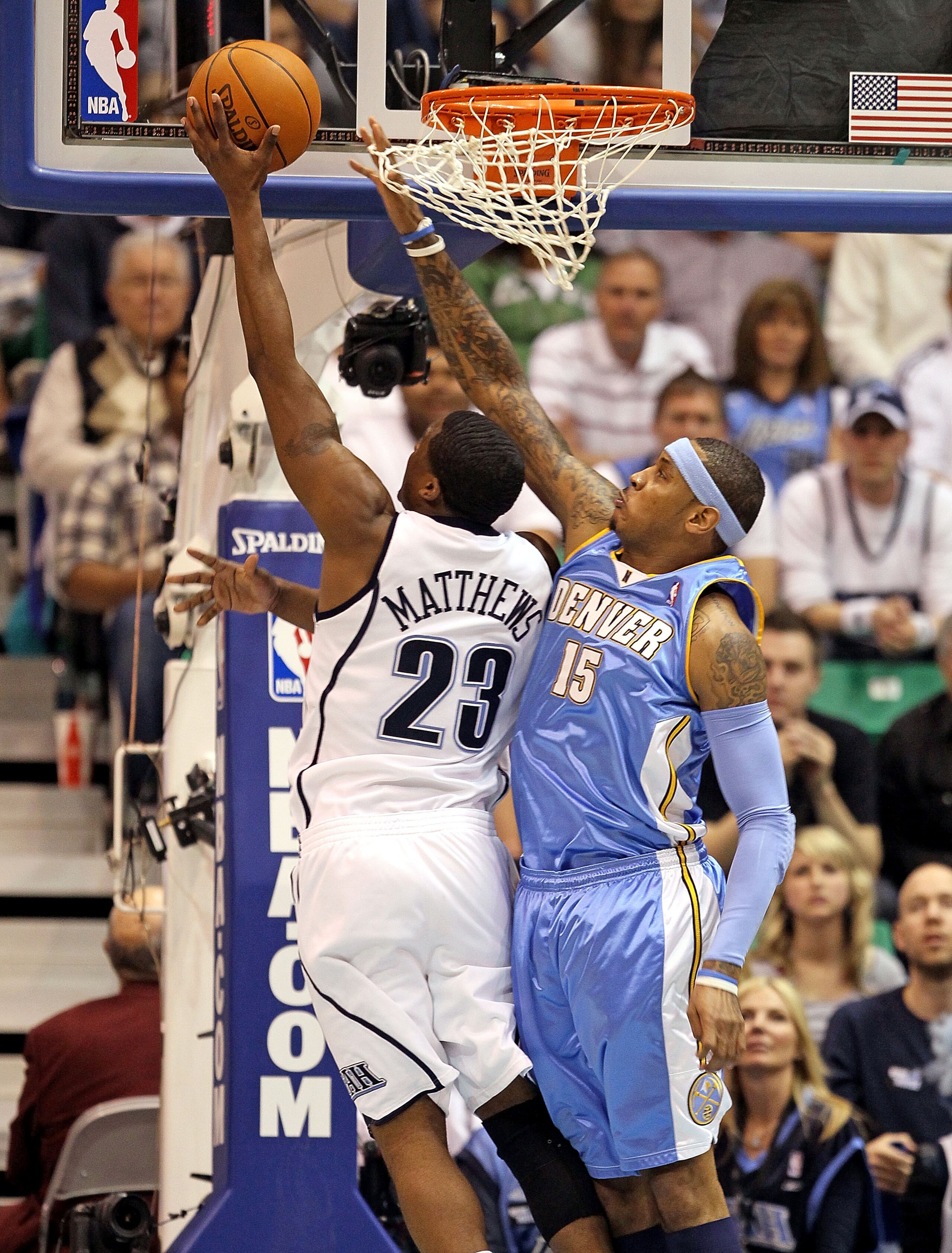 SALT LAKE CITY - APRIL 23: Carmelo Anthony #15 of the Denver Nuggets defends the shot of Wesley Matthews #23 of the Utah Jazz during  Game 3 of the Western Conference Quarterfinals of the 2010 NBA Playoffs at EnergySolutions Arena on April 23, 2010 in Sal