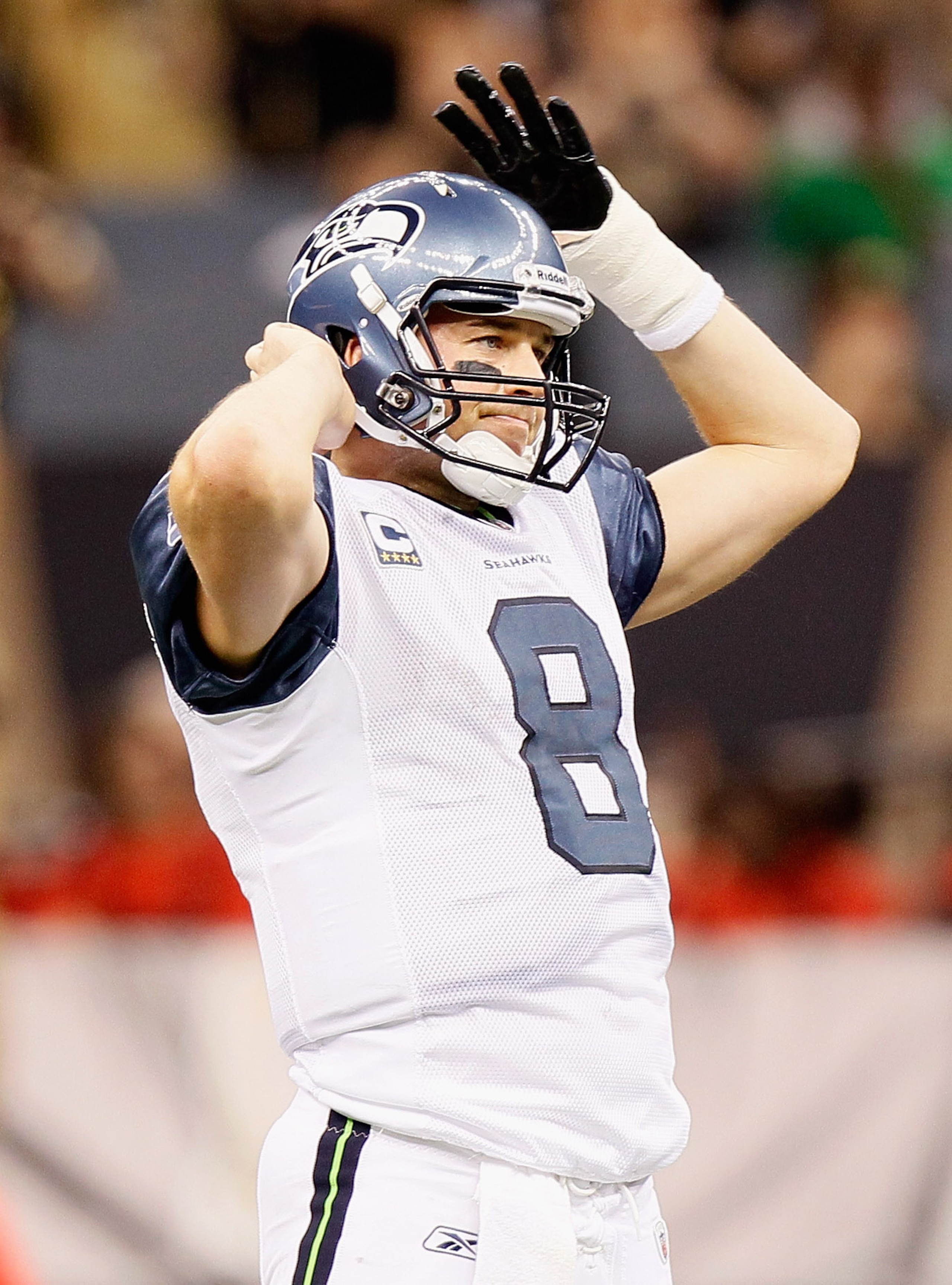 NEW ORLEANS - NOVEMBER 21:  Quarterback Matt Hasselbeck #8 of the Seattle Seahawks reacts after a turnover to the New Orleans Saints that was overturned into an incomplete pass on a coach's challenge at Louisiana Superdome on November 21, 2010 in New Orle
