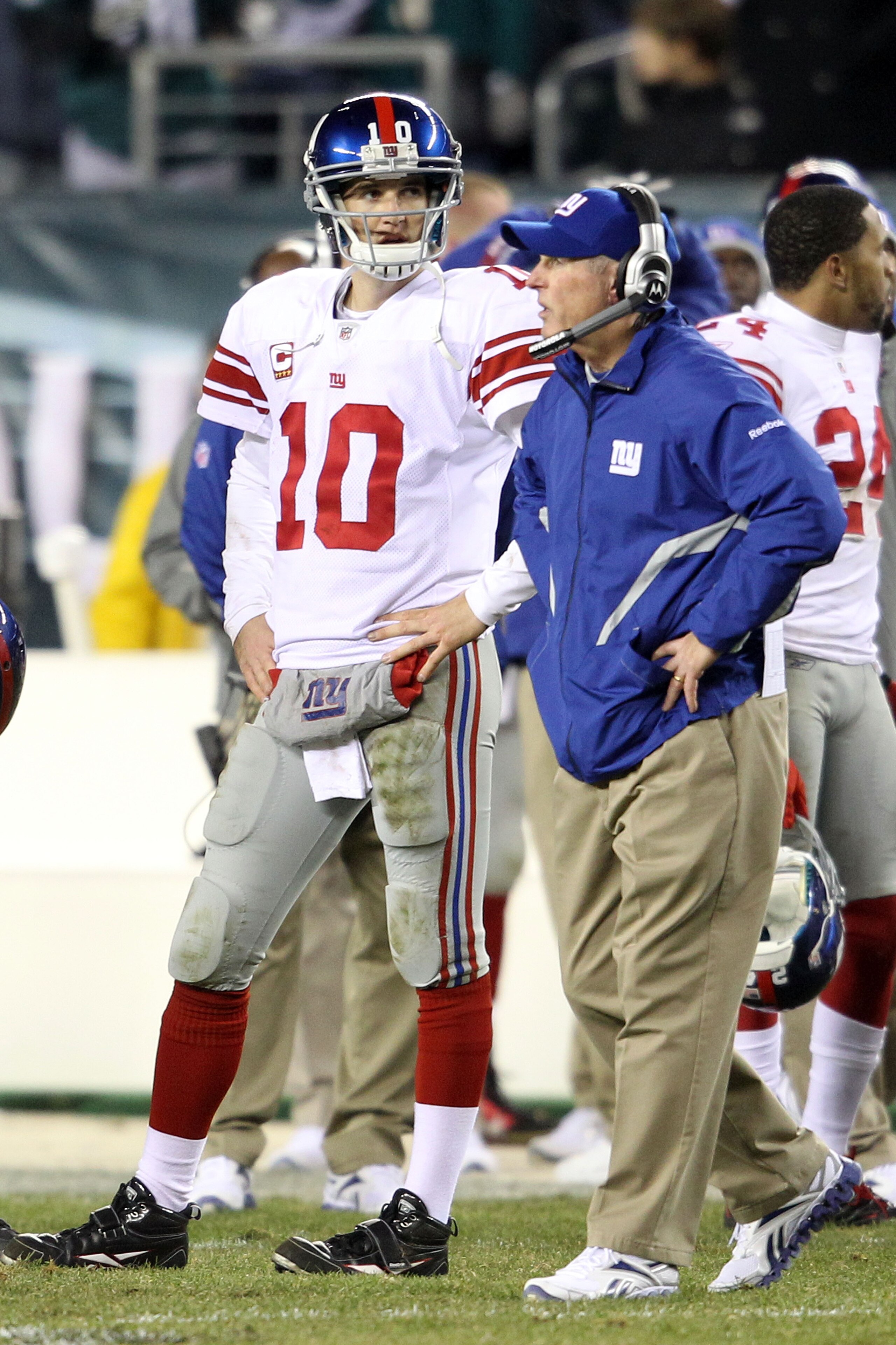 PHILADELPHIA - NOVEMBER 21:   Eli Manning #10 and head coach Tom Coughlin of the New York Giants look on during a challenge on a fumble by Manning late in the fourth quarter against the Philadelphia Eagles at Lincoln Financial Field on November 21, 2010 i