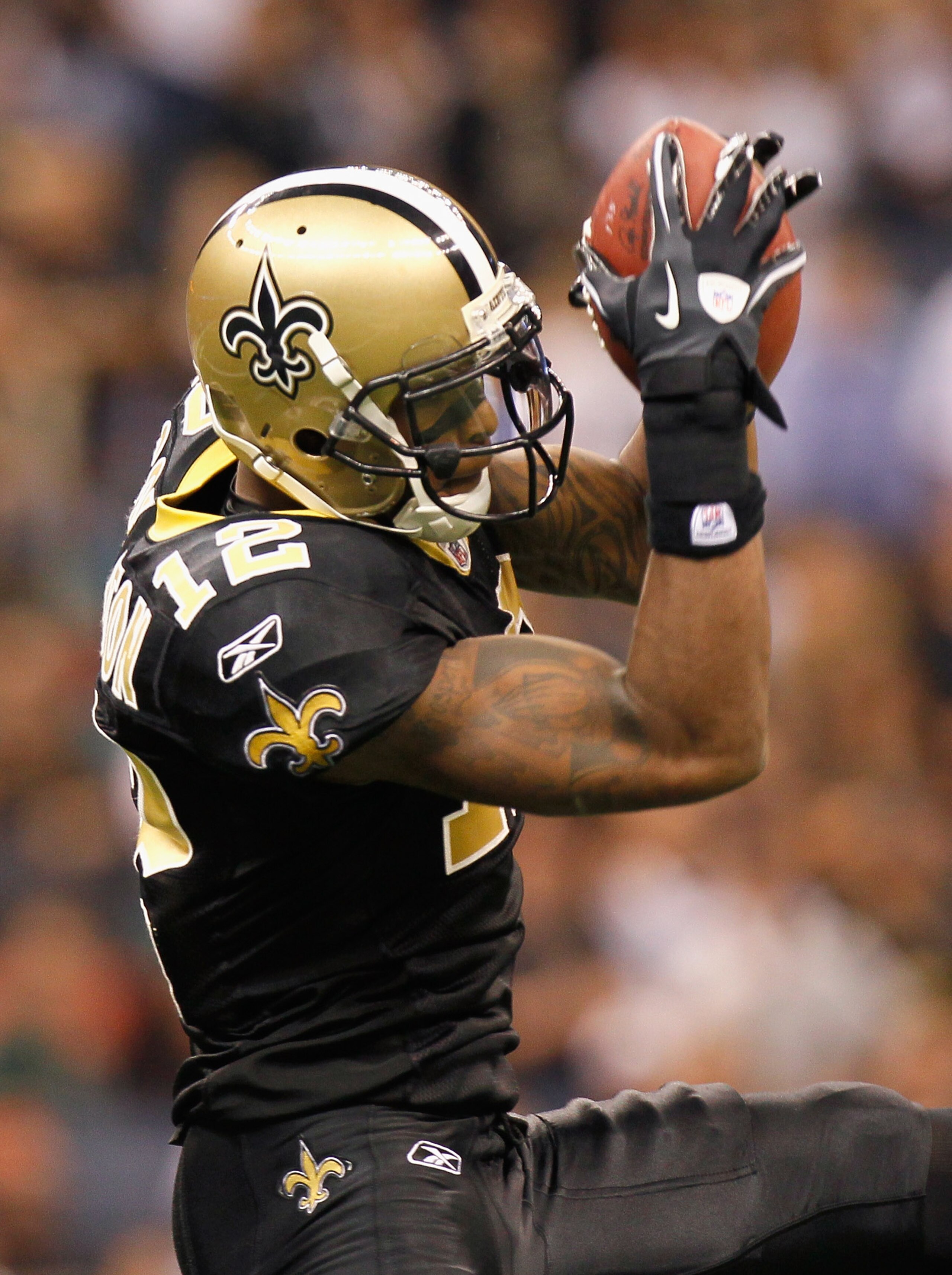 NEW ORLEANS - NOVEMBER 21:  Marques Colston #12 of the New Orleans Saints pulls in this reception against the Seattle Seahawks at Louisiana Superdome on November 21, 2010 in New Orleans, Louisiana.  (Photo by Kevin C. Cox/Getty Images)