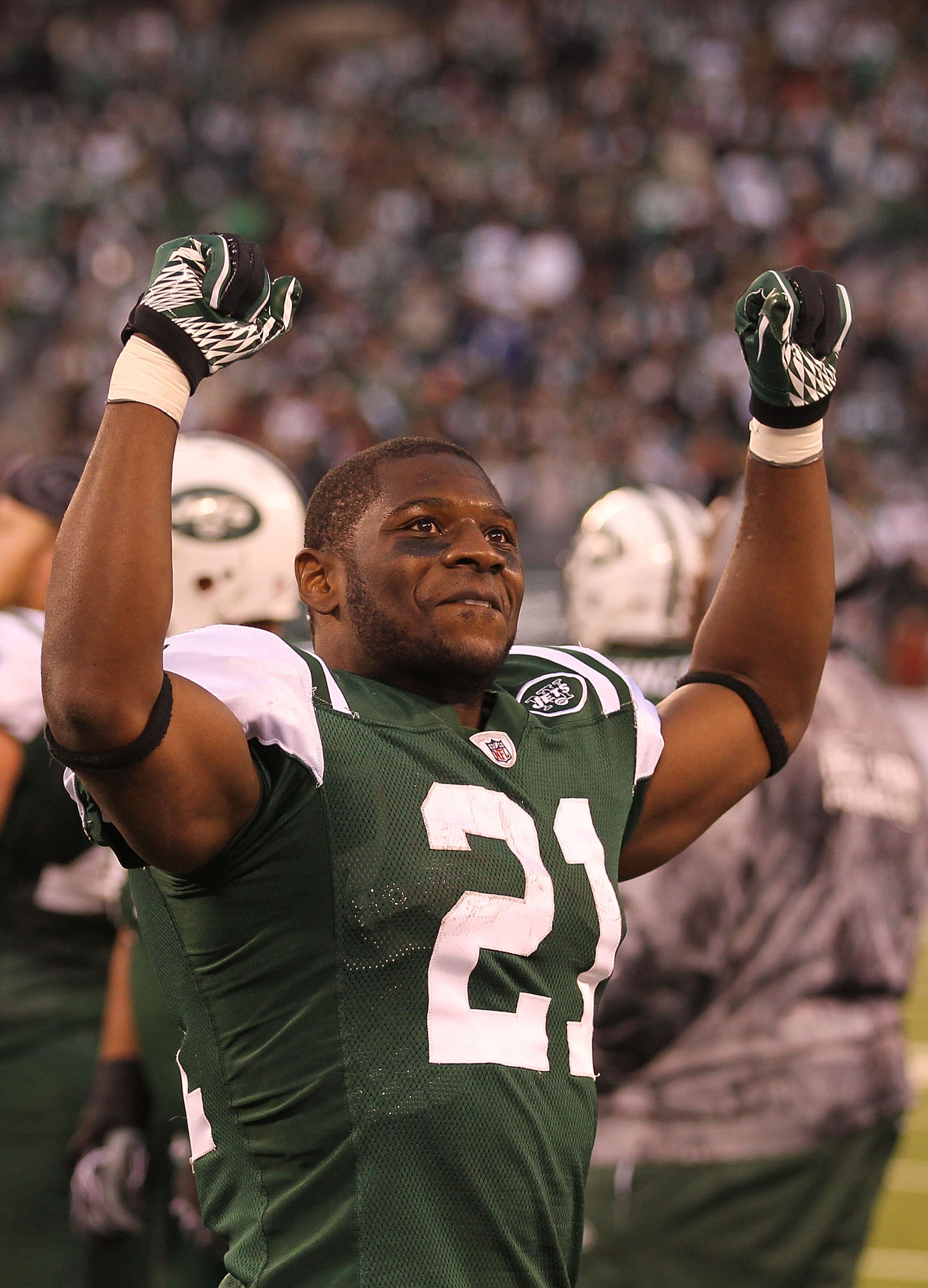 EAST RUTHERFORD, NJ - NOVEMBER 21:  LaDainian Tomlinson #21 of the New York Jets celebrates their 30-27 win against the Houston Texans during their  game on November 21, 2010 at the New Meadowlands Stadium  in East Rutherford, New Jersey.  (Photo by Al Be