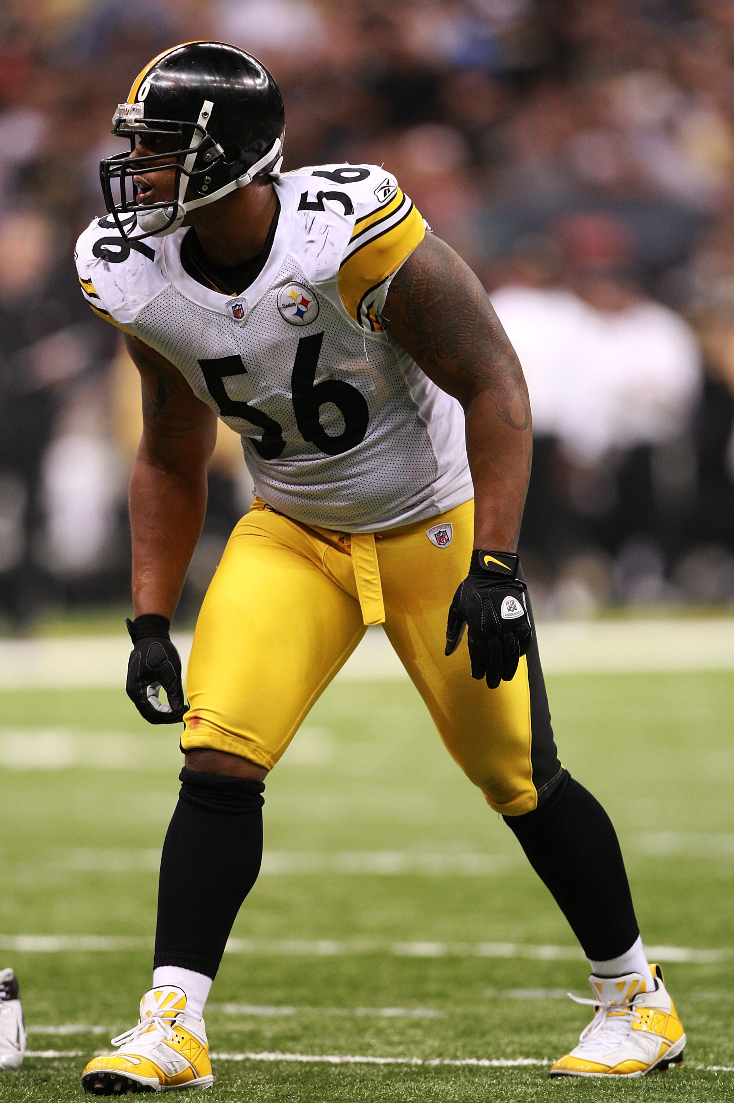 NEW ORLEANS - OCTOBER 31:  LaMarr Woodley #56 of the Pittsburgh Steelers hovers at the line of scrimmage during the game against the New Orleans Saints at Louisiana Superdome on October 31, 2010 in New Orleans, Louisiana.  The Saints won 20-10 over the St