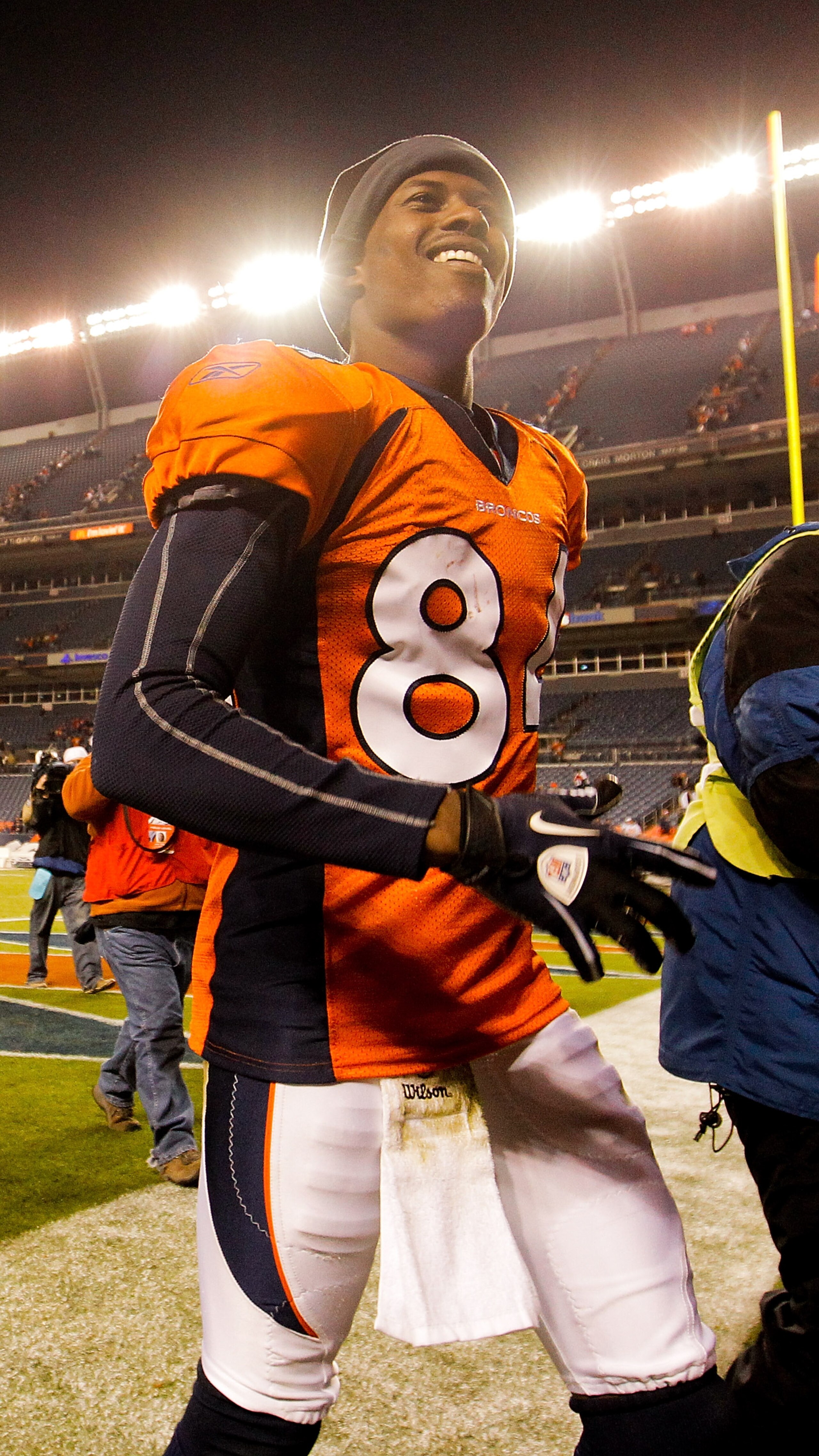 DENVER - NOVEMBER 14:  Wide receiver Brandon Lloyd #84 of the Denver Broncos celebrates the Broncos 49-29 win over the Kansas City Chiefs as he leaves the field at INVESCO Field at Mile High on November 14, 2010 in Denver, Colorado. (Photo by Justin Edmon