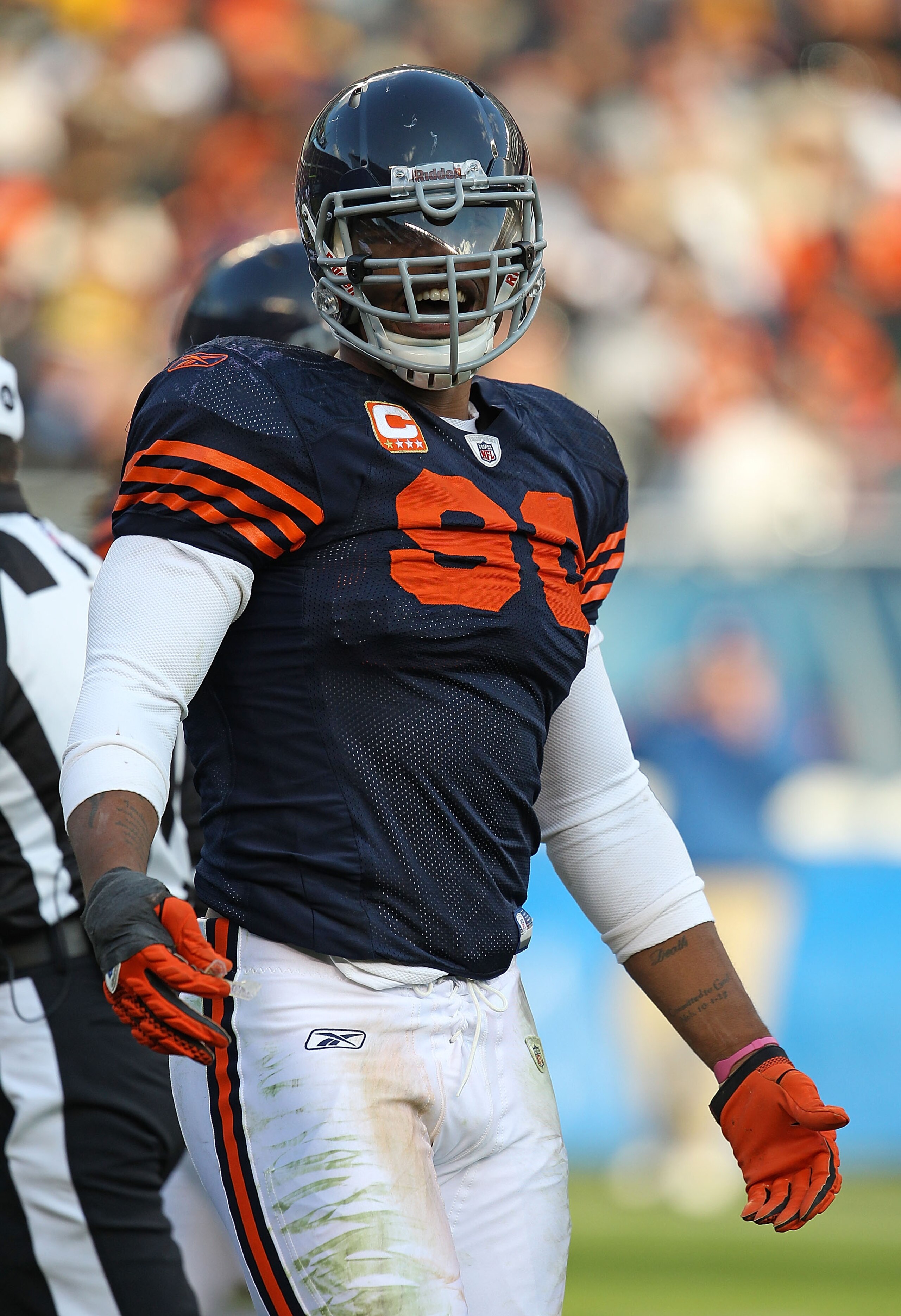 CHICAGO - NOVEMBER 14: Julius Peppers #90 of the Chicago Bears talks to a referee during a game against the Minnesota Vikings at Soldier Field on November 14, 2010 in Chicago, Illinois. The Bears defeated the Vikings 27-13. (Photo by Jonathan Daniel/Getty