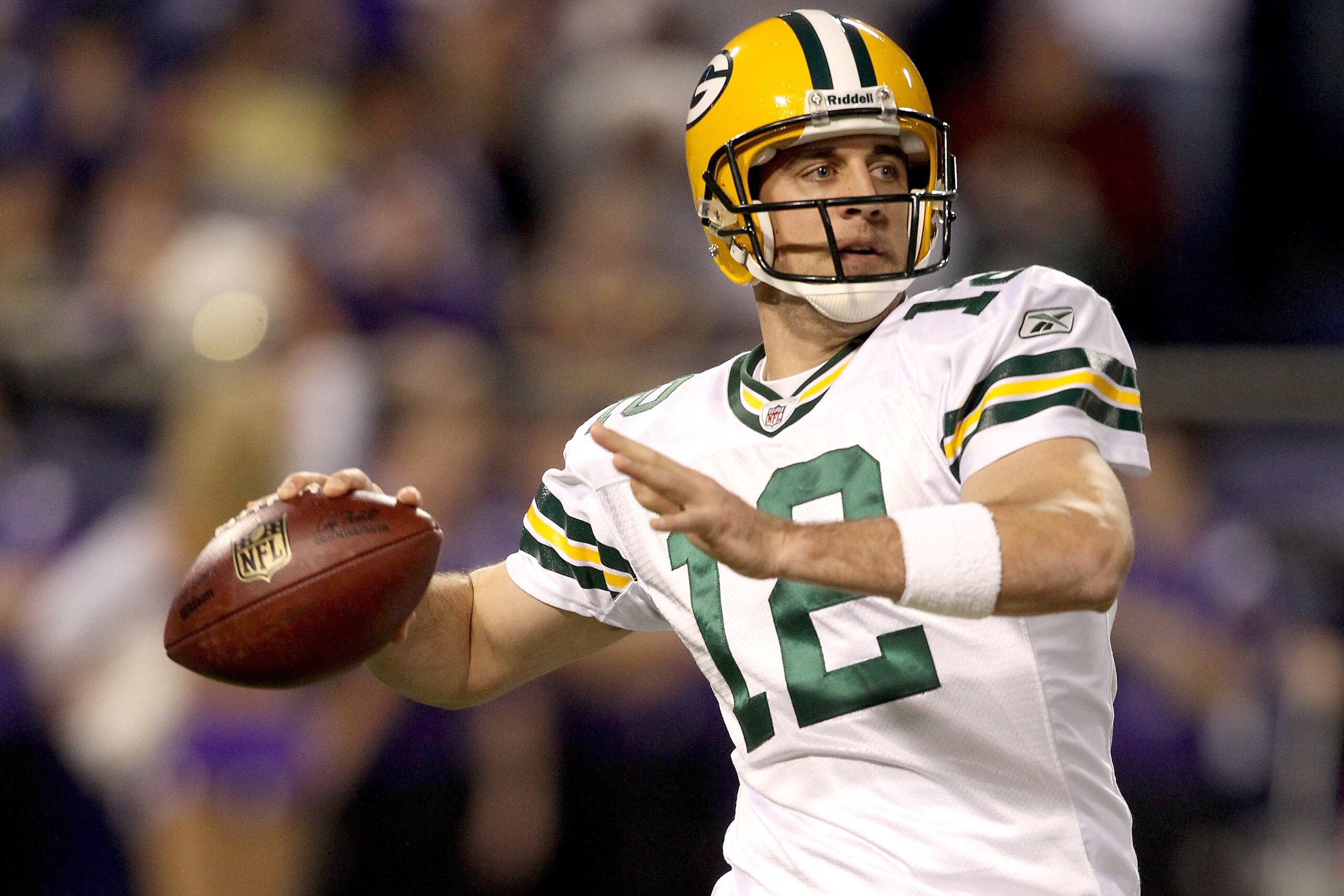 MINNEAPOLIS - NOVEMBER 21:  Quarterback Aaron Rodgers #12 of the Green Bay Packers throws against the Minnesota Vikings at the Hubert H. Humphrey Metrodome on November 21, 2010 in Minneapolis, Minnesota.  (Photo by Matthew Stockman/Getty Images)