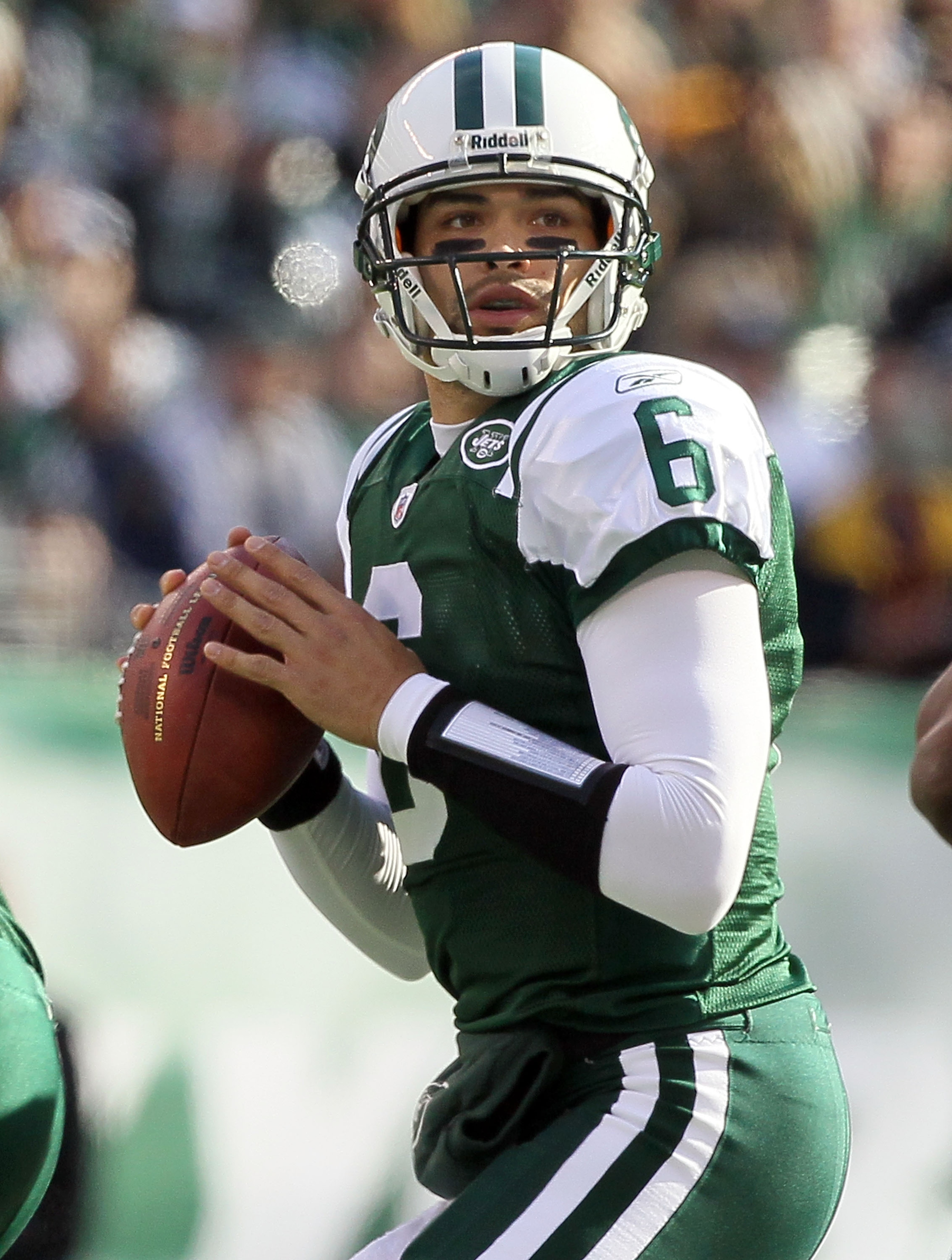 EAST RUTHERFORD, NJ - NOVEMBER 21:  Mark Sanchez #6 of the New York Jets looks to throw a pass against the Houston Texans on November 21, 2010 at the New Meadowlands Stadium in East Rutherford, New Jersey.  (Photo by Jim McIsaac/Getty Images)