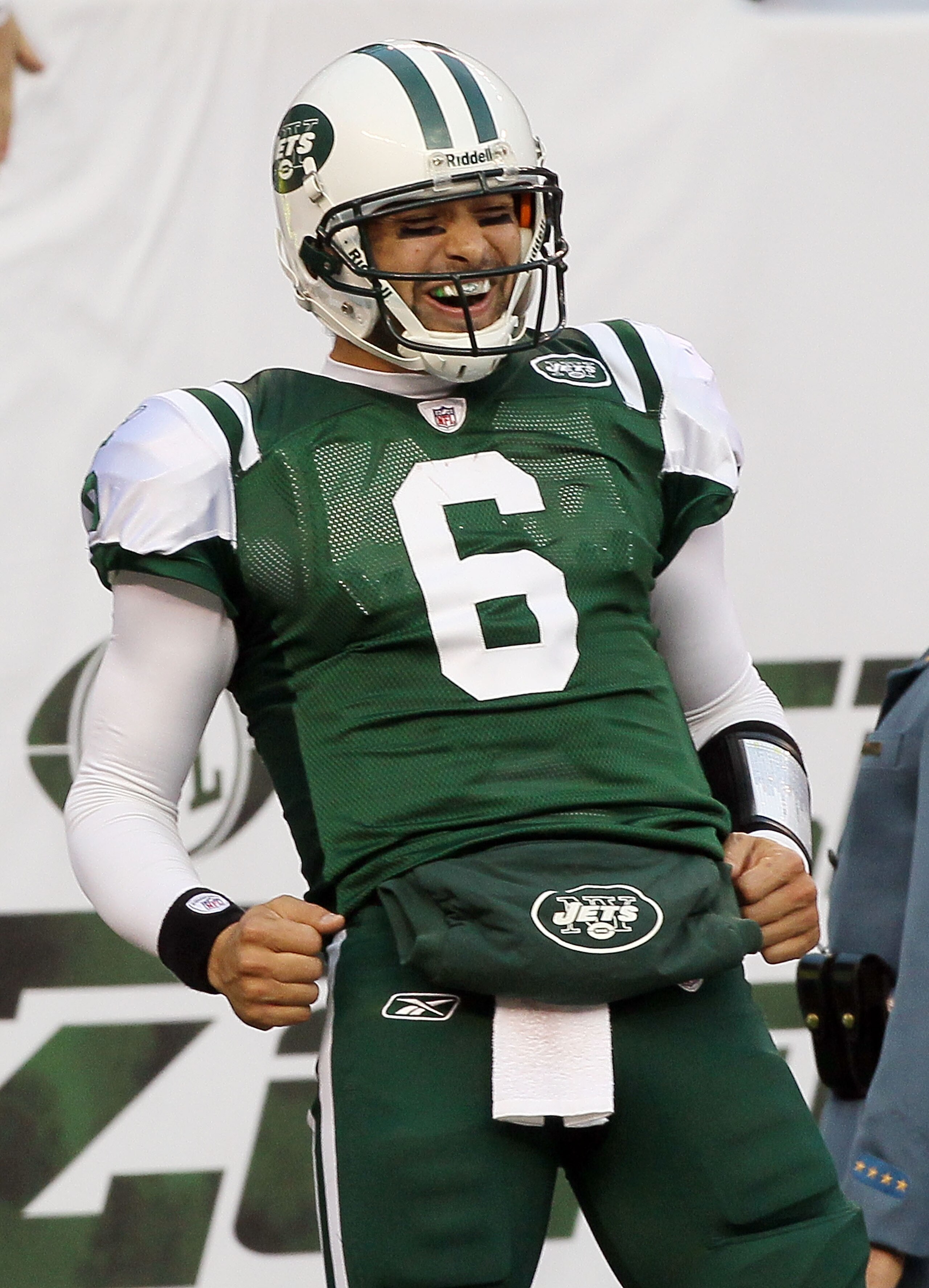 EAST RUTHERFORD, NJ - NOVEMBER 21:  Mark Sanchez #6 of the New York Jets celebrates a third quarter touchdown against the Houston Texans from teammate Santonio Holmes (not pictured) on November 21, 2010 at the New Meadowlands Stadium in East Rutherford, N