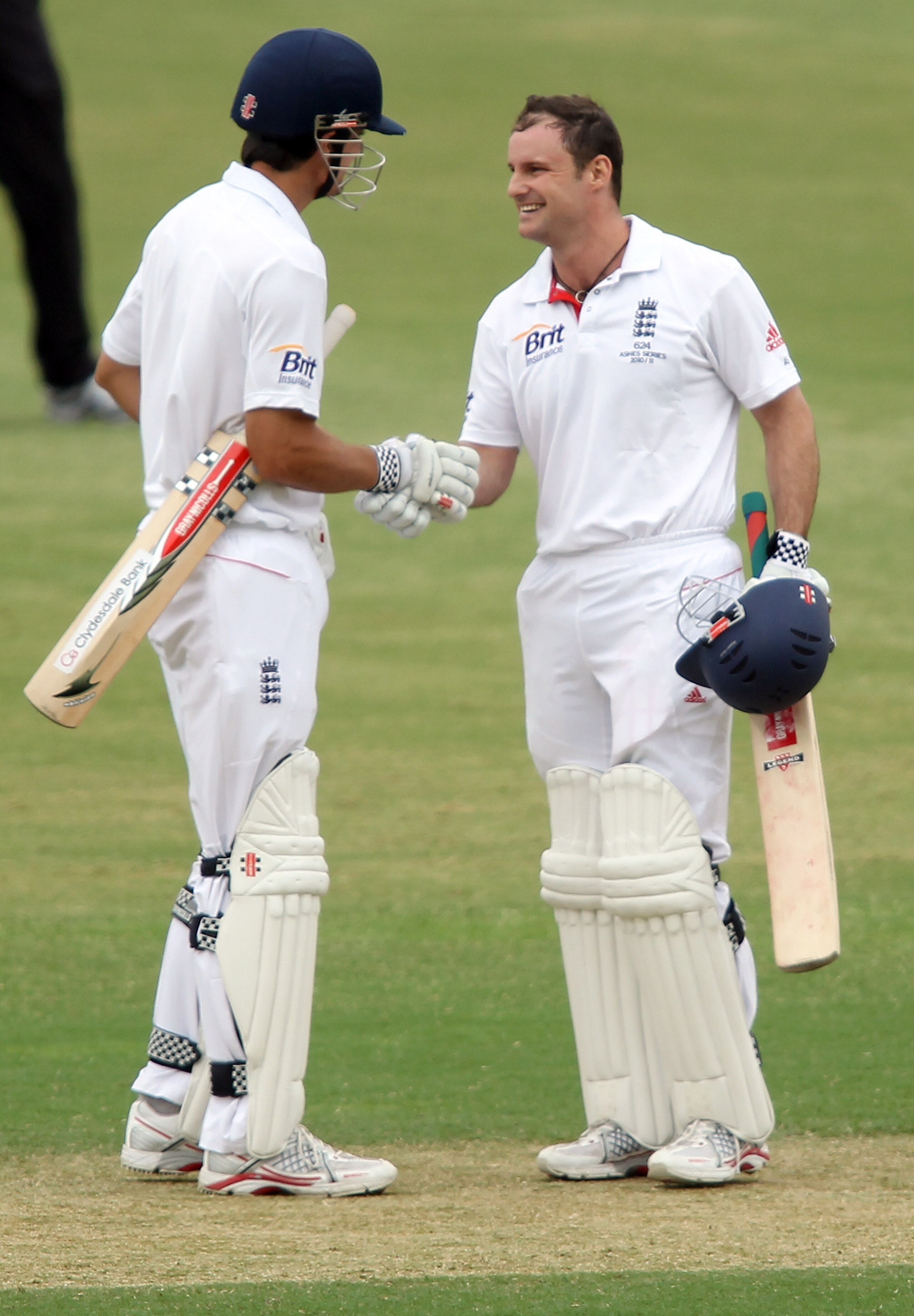ADELAIDE, AUSTRALIA - NOVEMBER 13:  Andrew Strauss of England celebrates making 100 runs with batting partner Alastair Cook during day three of the Tour Match between the South Australian Redbacks and England at Adelaide Oval on November 13, 2010 in Adela