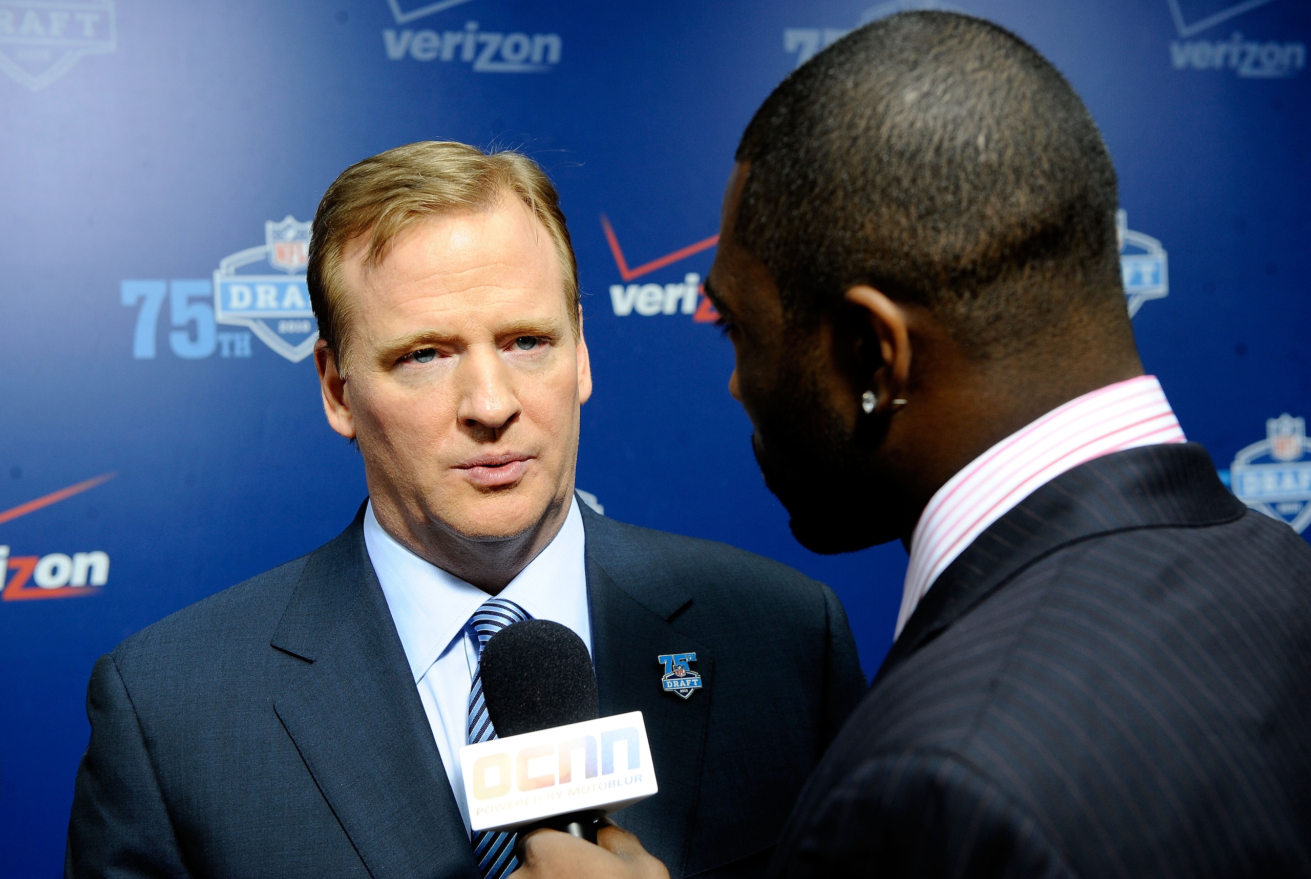 NEW YORK - APRIL 22:  NFL Commissioner Roger Goodell is interviewed by Darrelle Revis of the New York Jets for the 'Ocho Cinco New Network' on the red carpet during the 2010 NFL Draft at Radio City Music Hall on April 22, 2010 in New York City.  (Photo by