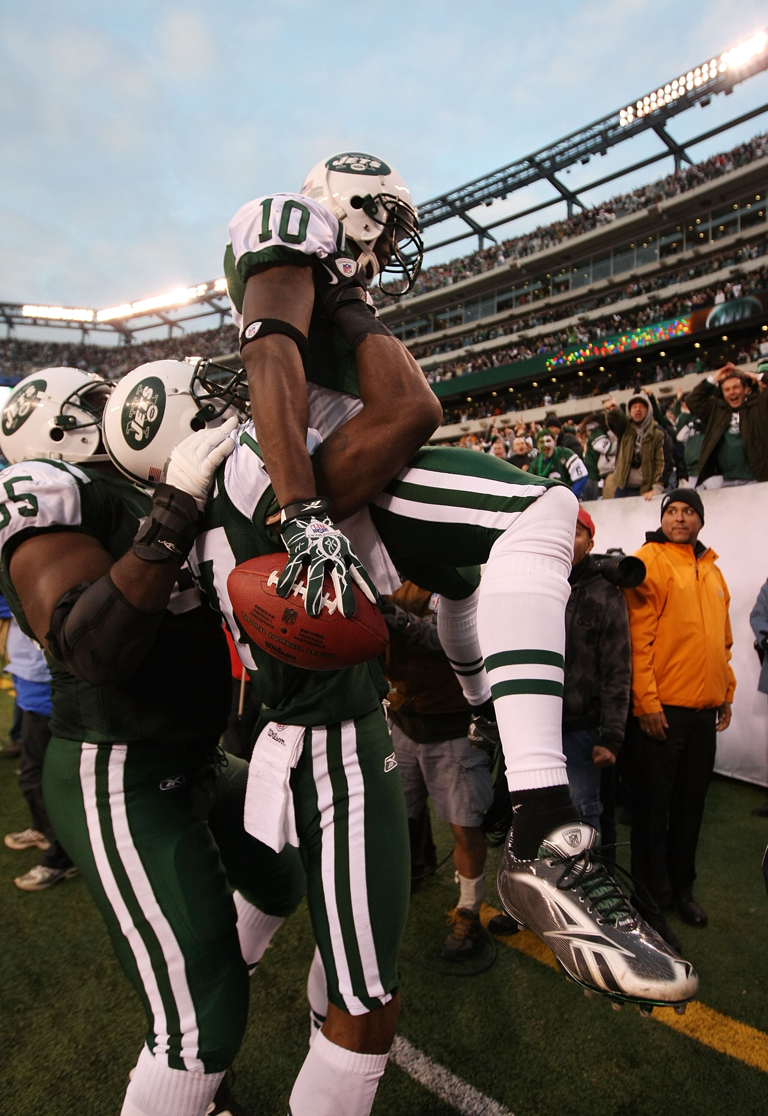 EAST RUTHERFORD, NJ - NOVEMBER 21:  Santonio Holmes #10 of the New York Jets celebrates with Braylon Edwards #17 after scoring the winning  touchdown against  the Houston Texans during the fourth quarter of their  game on November 21, 2010 at the New Mead