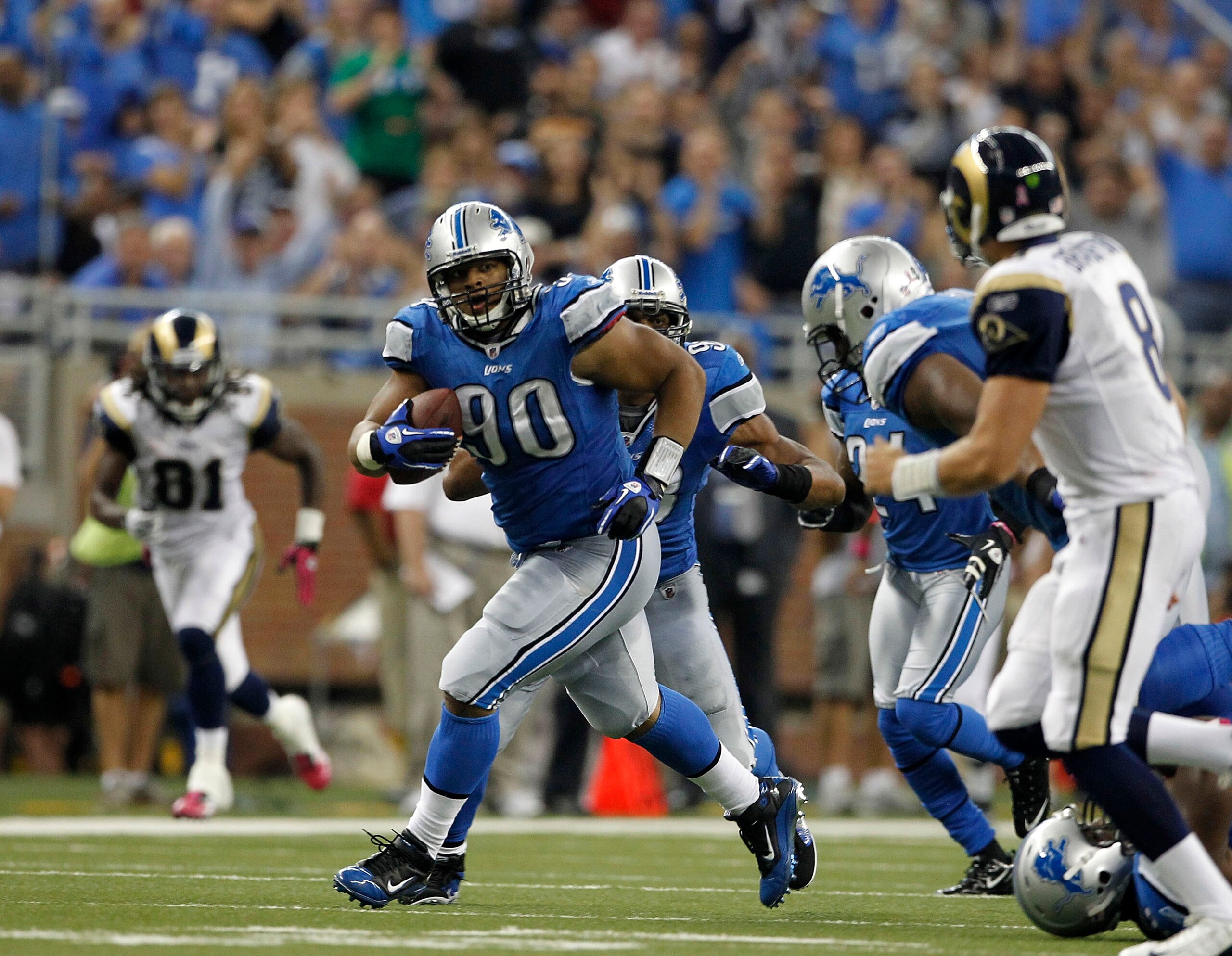 DETROIT - OCTOBER 10: Ndamukong Suh #90 of the Detroit Lions intercepts the ball and runs it back during the fourth quarter of the game against the St. Louis Rams at Ford Field on October 10, 2010 in Detroit, Michigan. The Lions defeated the Rams 44-6. DETROIT - OCTOBER 10: Ndamukong Suh #90 of the Detroit Lions intercepts the ball and runs it back during the fourth quarter of the game against the St. Louis Rams at Ford Field on October 10, 2010 in Detroit, Michigan. The Lions defeated the Rams 44-6.