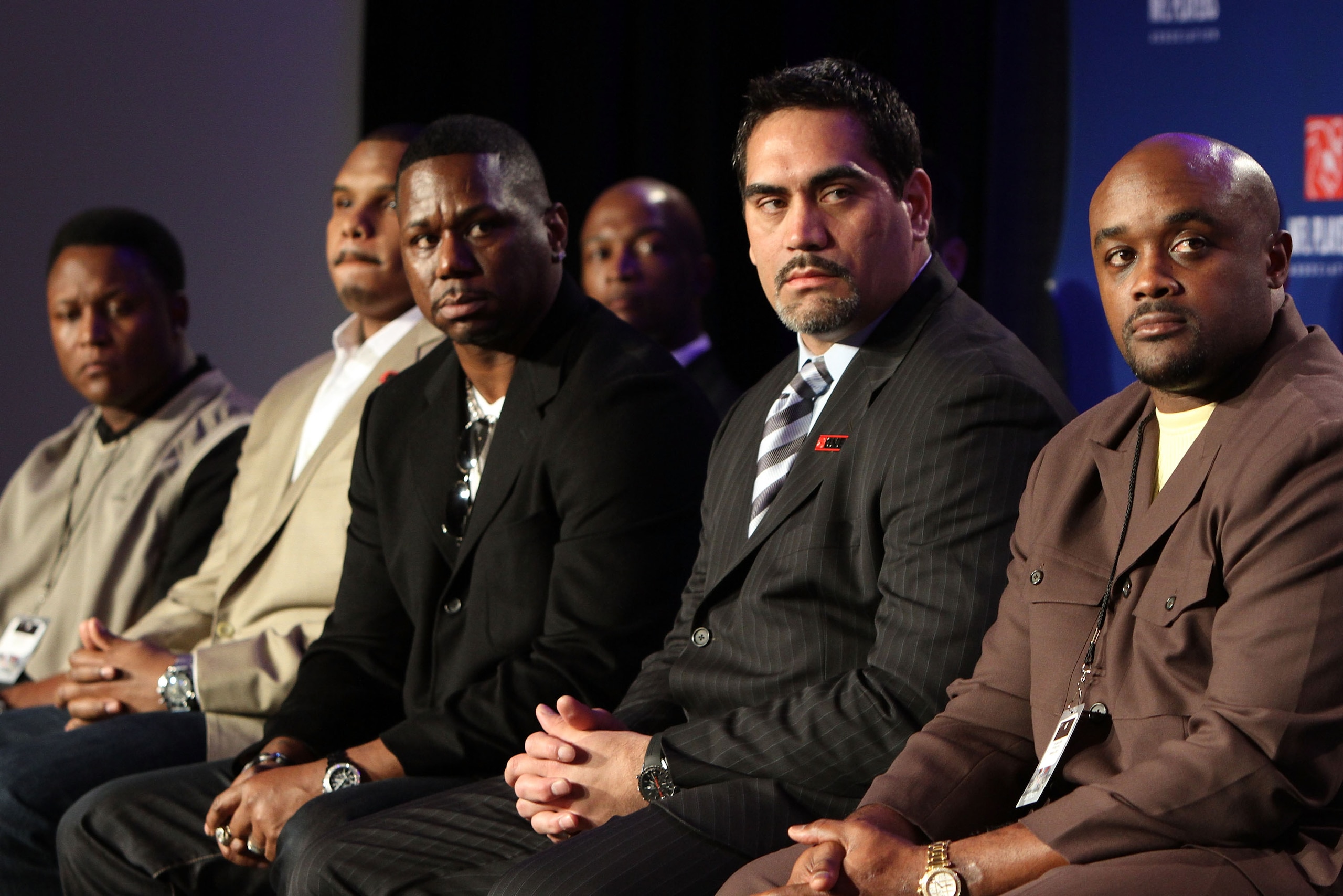 FORT LAUDERDALE, FL - FEBRUARY 04:  Center Kevin Mawae #68 of the Tennessee Titans and President of the NFL Player's Association (2nd R), former NFL running backs Ricky Watters (C) and Barry Sanders (L) look on during the NFL Player's Association Press Co