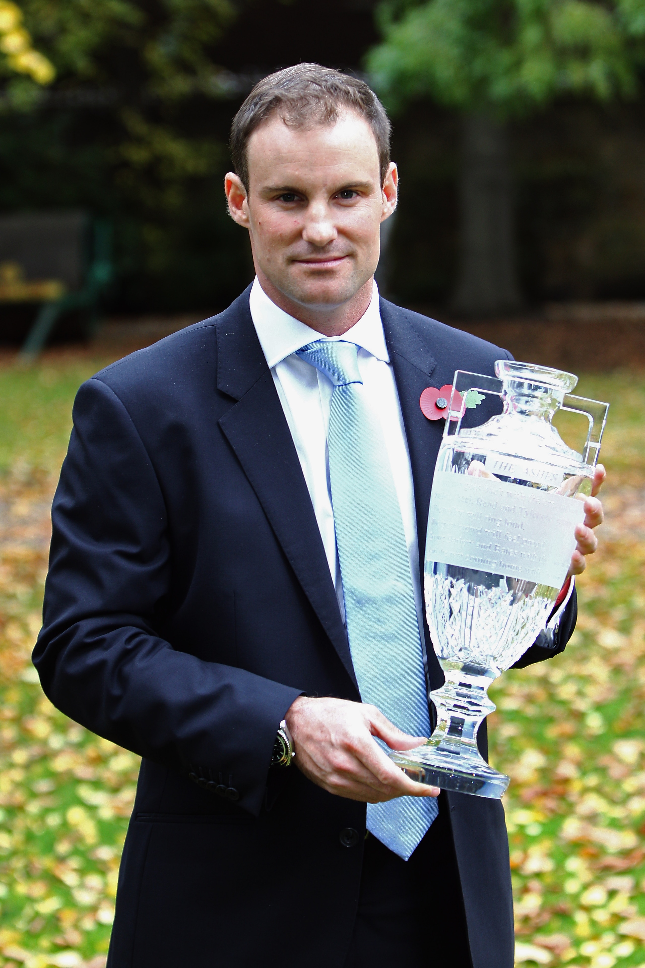 LONDON, ENGLAND - OCTOBER 28:  England Captian, Andrew Strauss poses with the The Waterford Crystal Replica of the Ashes Trophy after his Press Conference prior to the Ashes Tour of Australia at Lords on October 28, 2010 in London, England.  (Photo by Dea