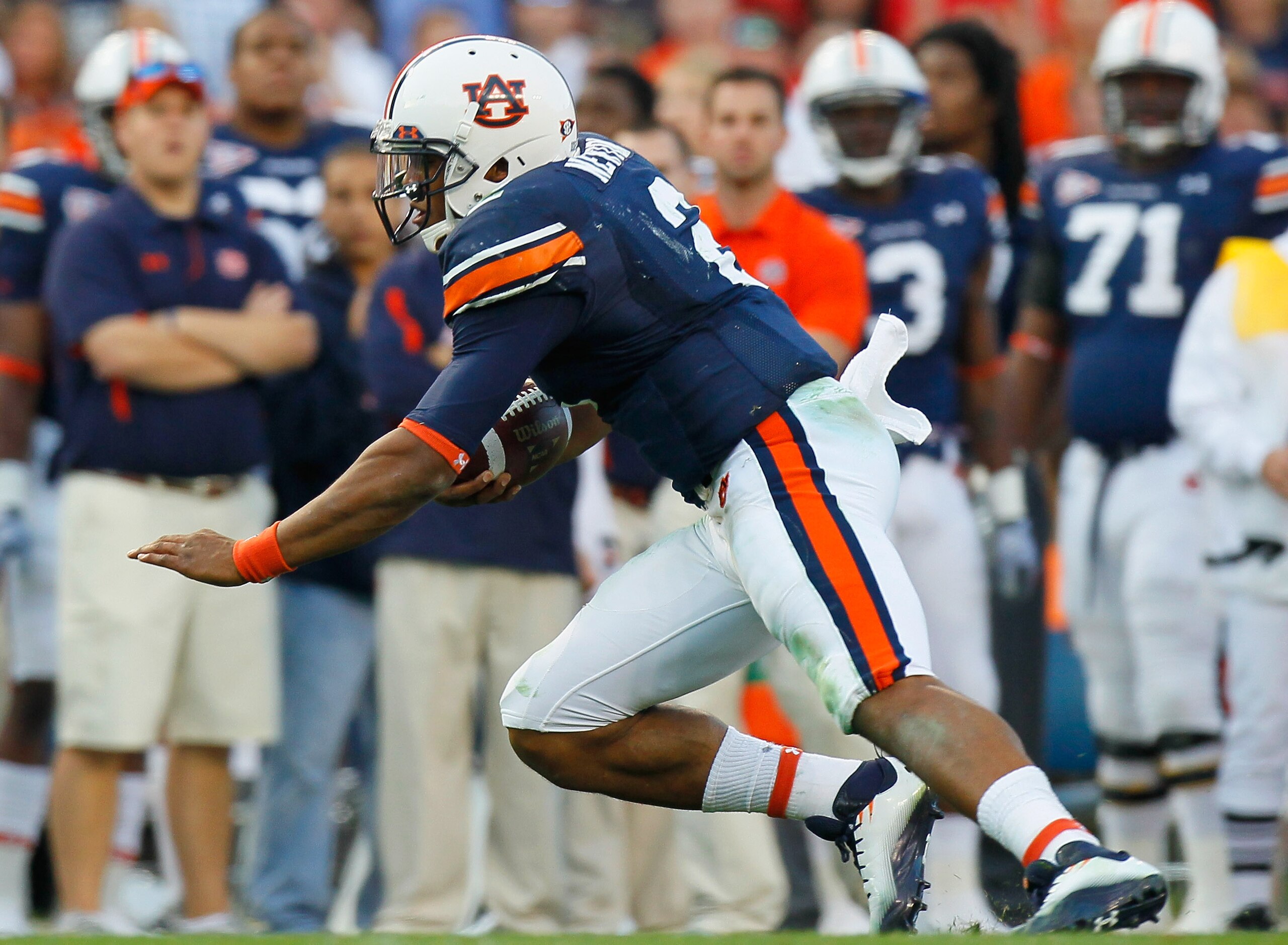 AUBURN, AL - NOVEMBER 13:  Quarterback Cameron Newton #2 of the Auburn Tigers dives for more yardage against the Georgia Bulldogs at Jordan-Hare Stadium on November 13, 2010 in Auburn, Alabama.  (Photo by Kevin C. Cox/Getty Images)