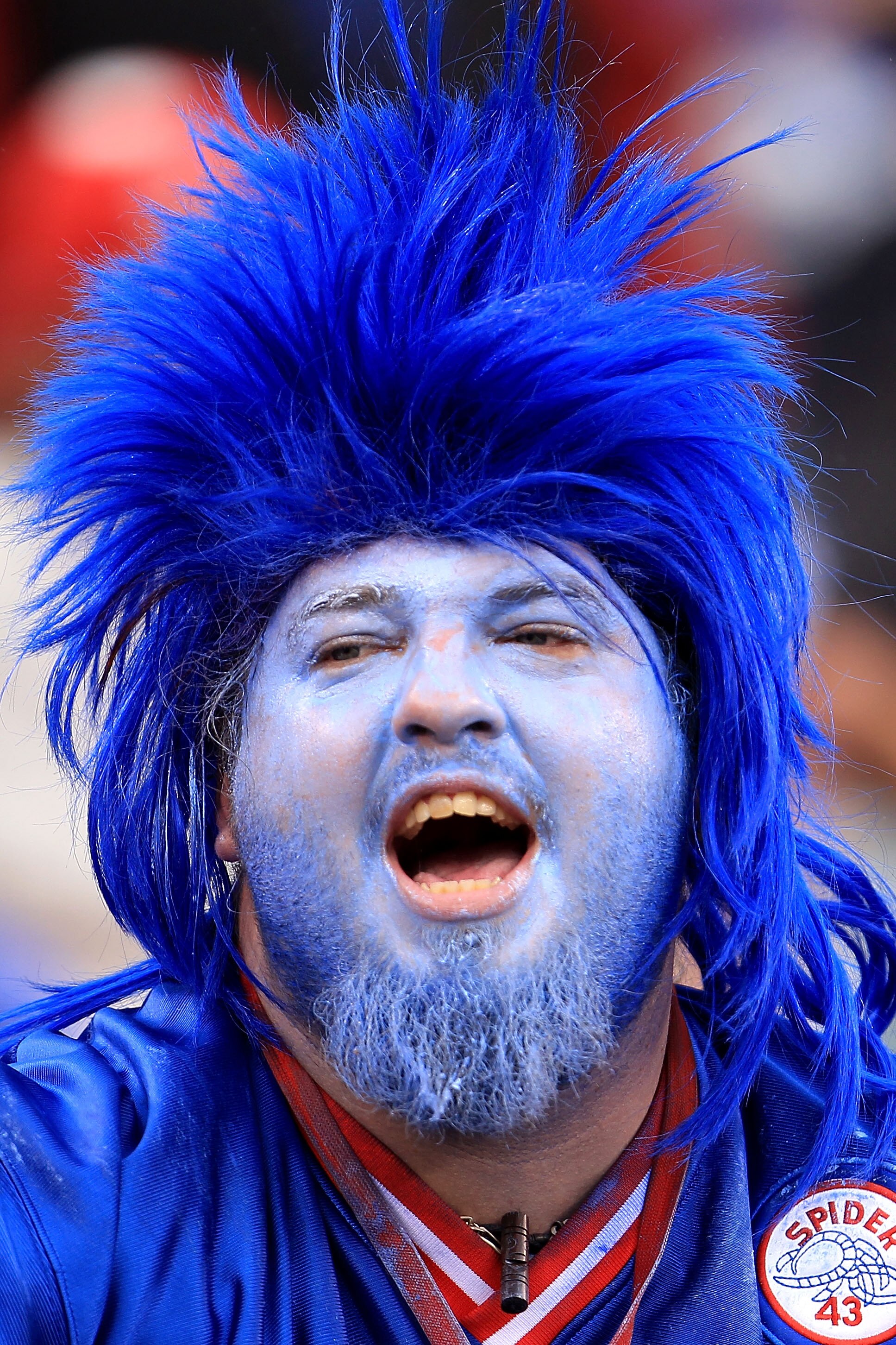 EAST RUTHERFORD, NJ - SEPTEMBER 12:  Giants fans show their colours during the NFL season opener between the New York Giants and the Carolina Panthers at New Meadowlands Stadium on September 12, 2010 in East Rutherford, New Jersey.  (Photo by Chris McGrat