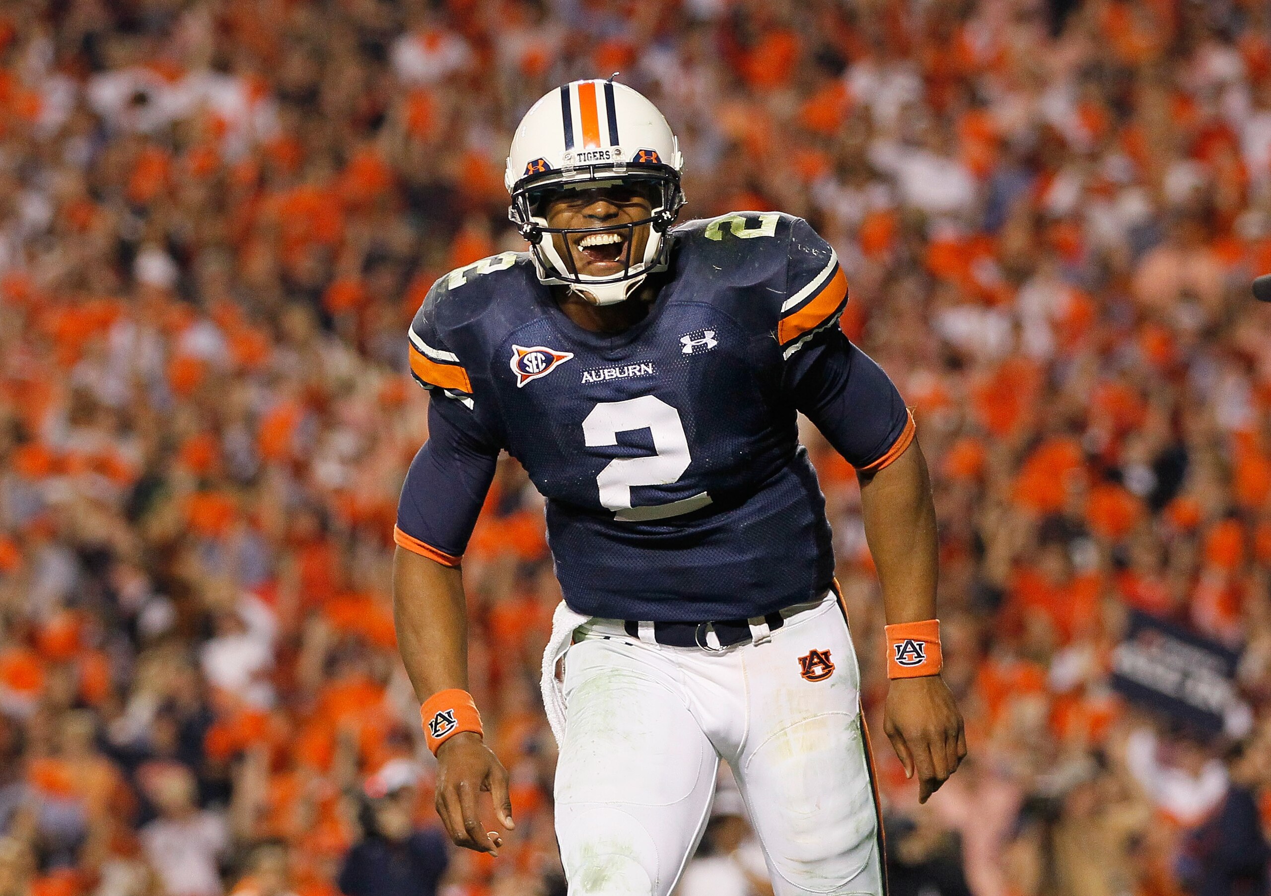 AUBURN, AL - NOVEMBER 13:  Quarterback Cameron Newton #2 of the Auburn Tigers celebrates after a touchdown against the Georgia Bulldogs at Jordan-Hare Stadium on November 13, 2010 in Auburn, Alabama.  (Photo by Kevin C. Cox/Getty Images)