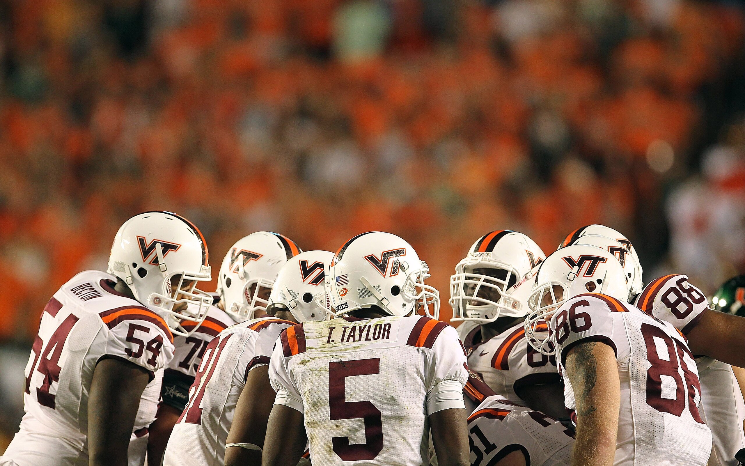 MIAMI - NOVEMBER 20:  Tyrod Taylor #5 of the Virginia Tech Hokies leads the huddle during a game against the Miami Hurricanes at Sun Life Stadium on November 20, 2010 in Miami, Florida.  (Photo by Mike Ehrmann/Getty Images)