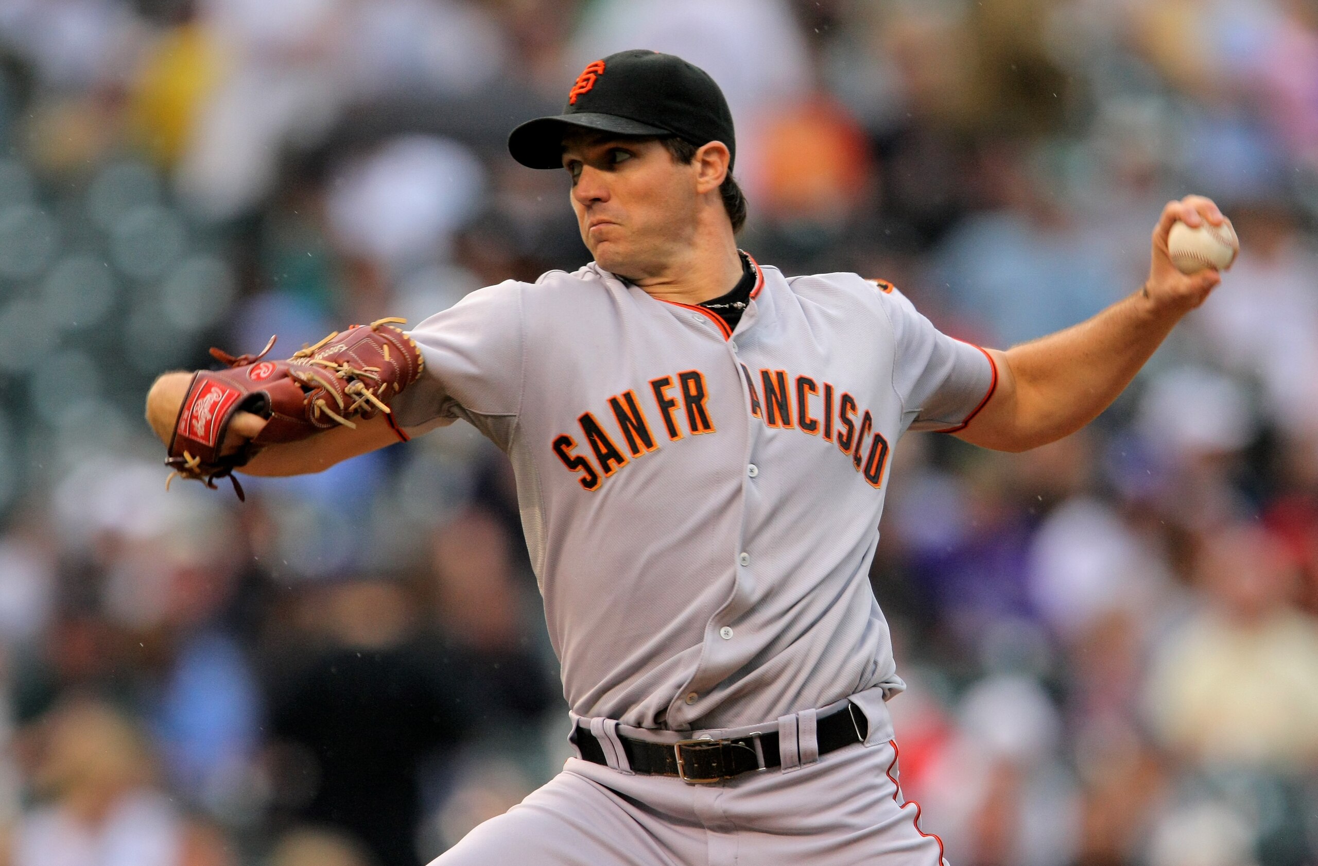 DENVER - AUGUST 24:  Starting pitcher Barry Zito #75 of the San Francisco Giants delivers against the Colorado Rockies at Coors Field on August 24, 2009 in Denver, Colorado.  (Photo by Doug Pensinger/Getty Images)