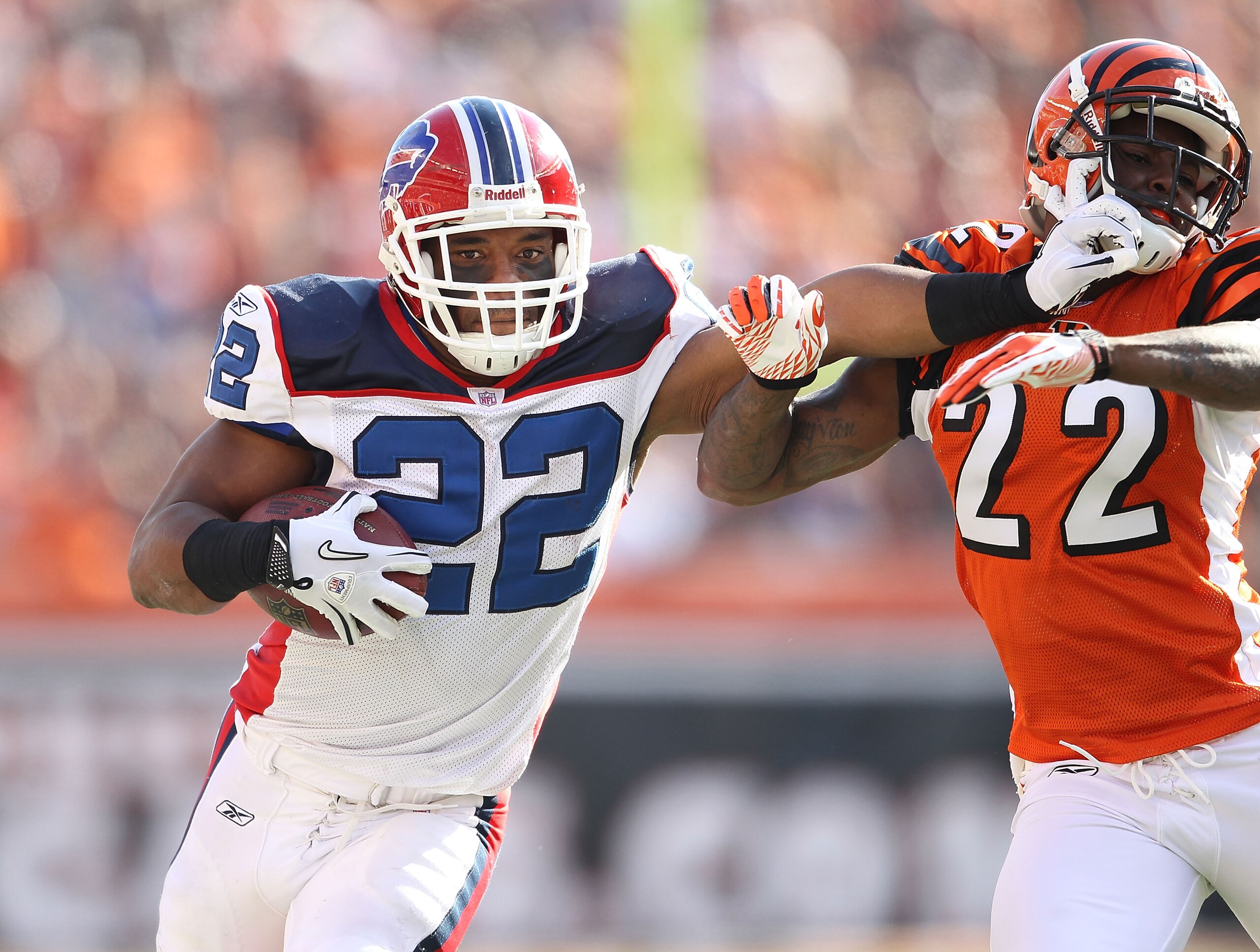 CINCINNATI - NOVEMBER 21:  Fred Jackson #22 of the Buffalo Bills runs with the ball while defended by Johnathan Joseph #22 of the Cincinnati Bengals during the NFL game at Paul Brown Stadium on November 21, 2010 in Cincinnati, Ohio. The Bills won 49-21.