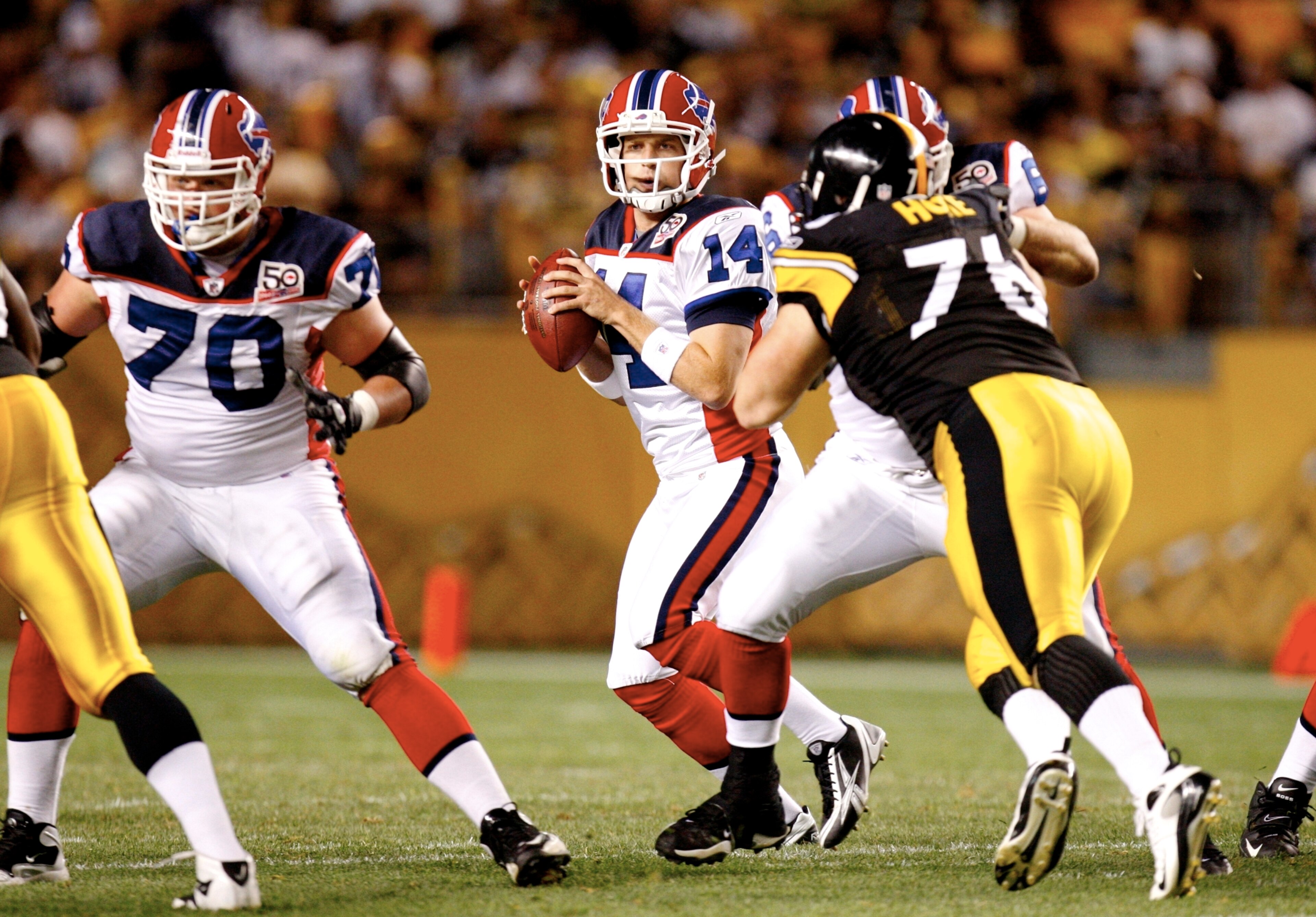 PITTSBURGH - AUGUST 29: Quarterback Ryan Fitzpatrick #14 of the Buffalo Bills looks to pass downfield in the third quarter during the game against the Pittsburgh Steelers at Heinz Field on August 29, 2009 in Pittsburgh, Pennsylvania. (Photo by Gregory Sha