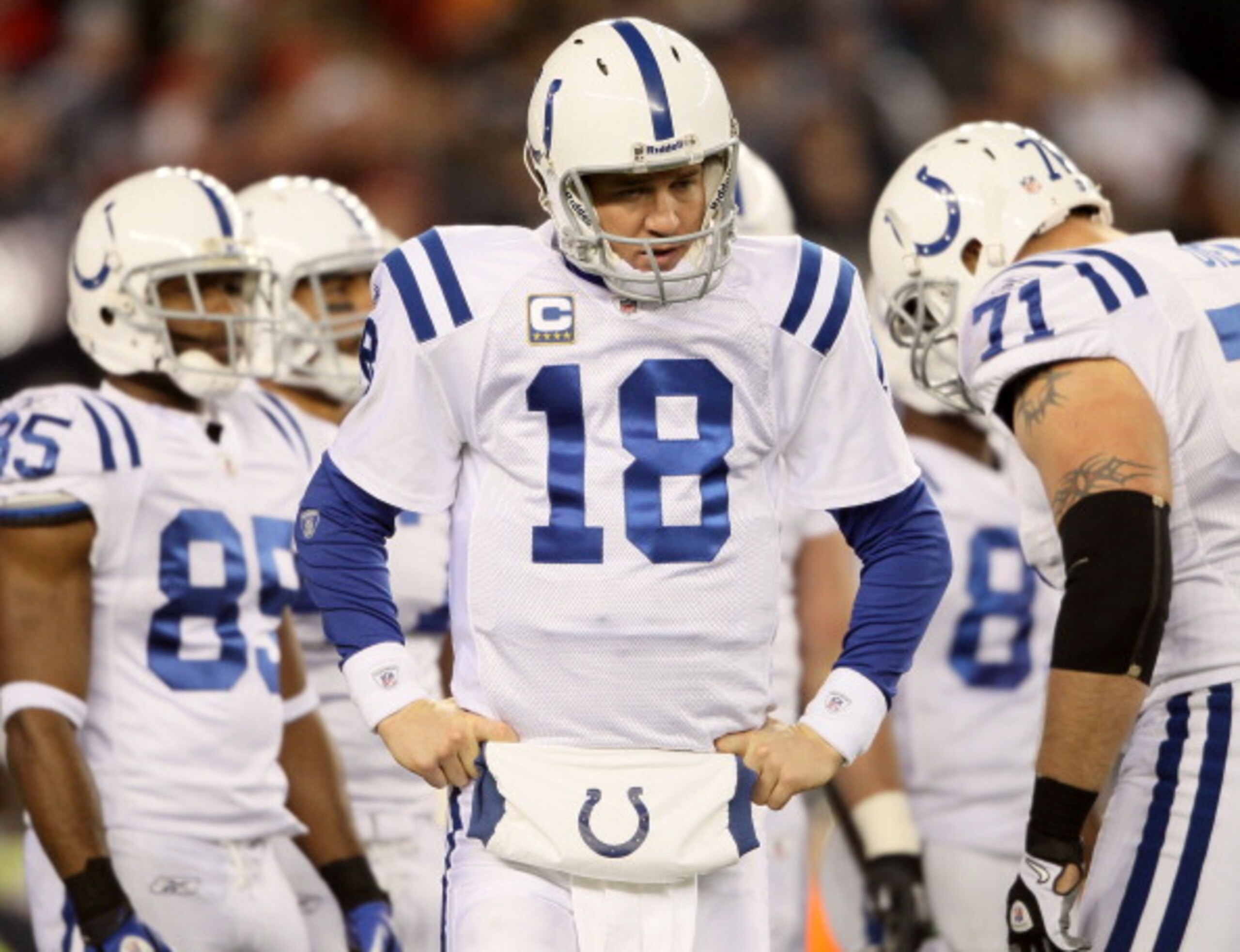 FOXBORO, MA - NOVEMBER 21: Peyton Manning #18 of the Indianapolis Colts looks on during a time out in the second half against the New England Patriots on November 21, 2010 at Gillette Stadium in Foxboro, Massachusetts. The Patriots defeated the Colts 31- FOXBORO, MA - NOVEMBER 21: Peyton Manning #18 of the Indianapolis Colts looks on during a time out in the second half against the New England Patriots on November 21, 2010 at Gillette Stadium in Foxboro, Massachusetts. The Patriots defeated the Colts 31-