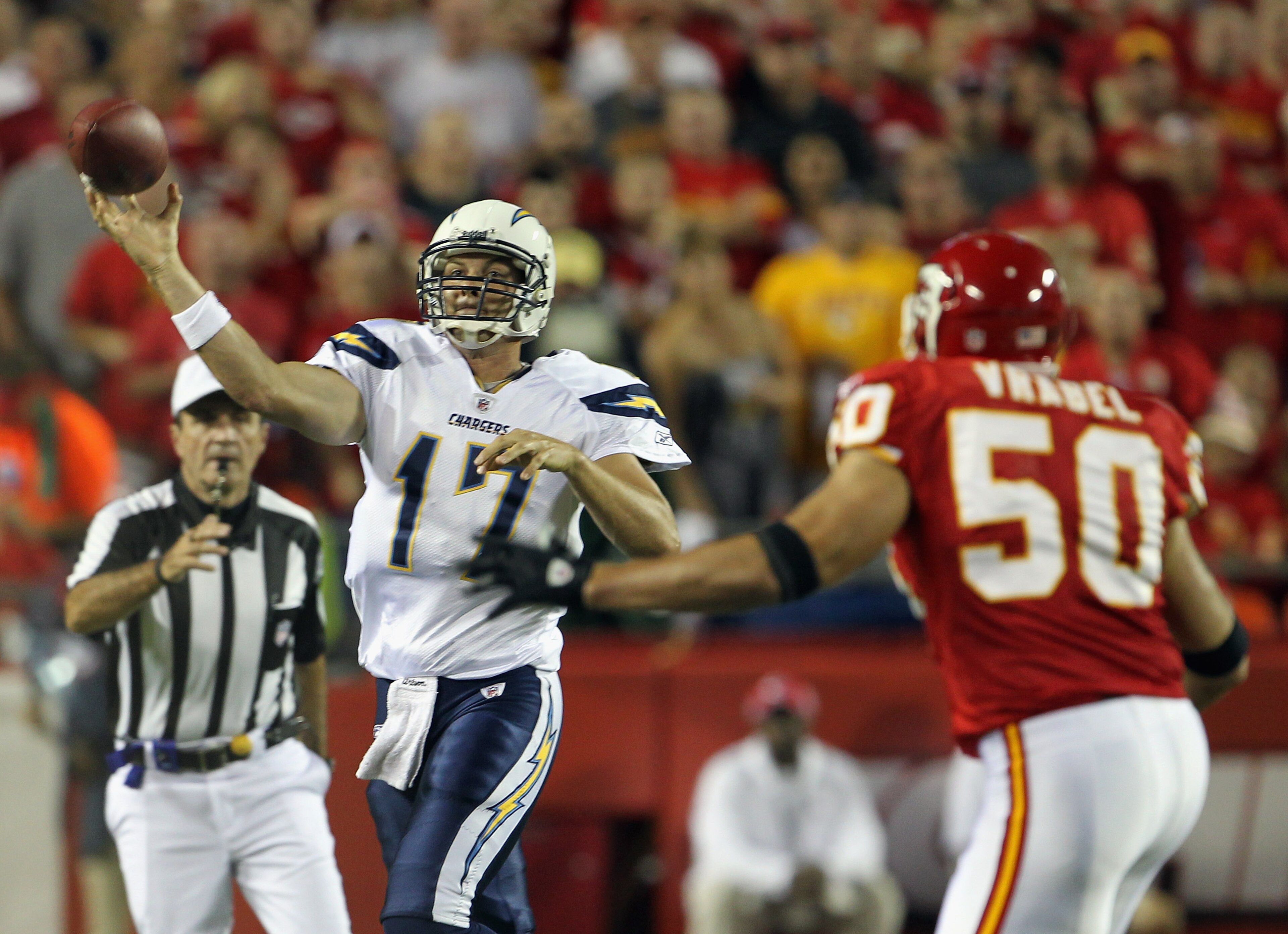 KANSAS CITY, MO - SEPTEMBER 13: Quarterback Philip Rivers #17 of the San Diego Chargers passes as he is rushed by Mike Vrabel #50 of the Kansas City Chiefs during the 1st quarter of the game on September 13, 2010 at Arrowhead Stadium in Kansas City, Miss KANSAS CITY, MO - SEPTEMBER 13: Quarterback Philip Rivers #17 of the San Diego Chargers passes as he is rushed by Mike Vrabel #50 of the Kansas City Chiefs during the 1st quarter of the game on September 13, 2010 at Arrowhead Stadium in Kansas City, Miss