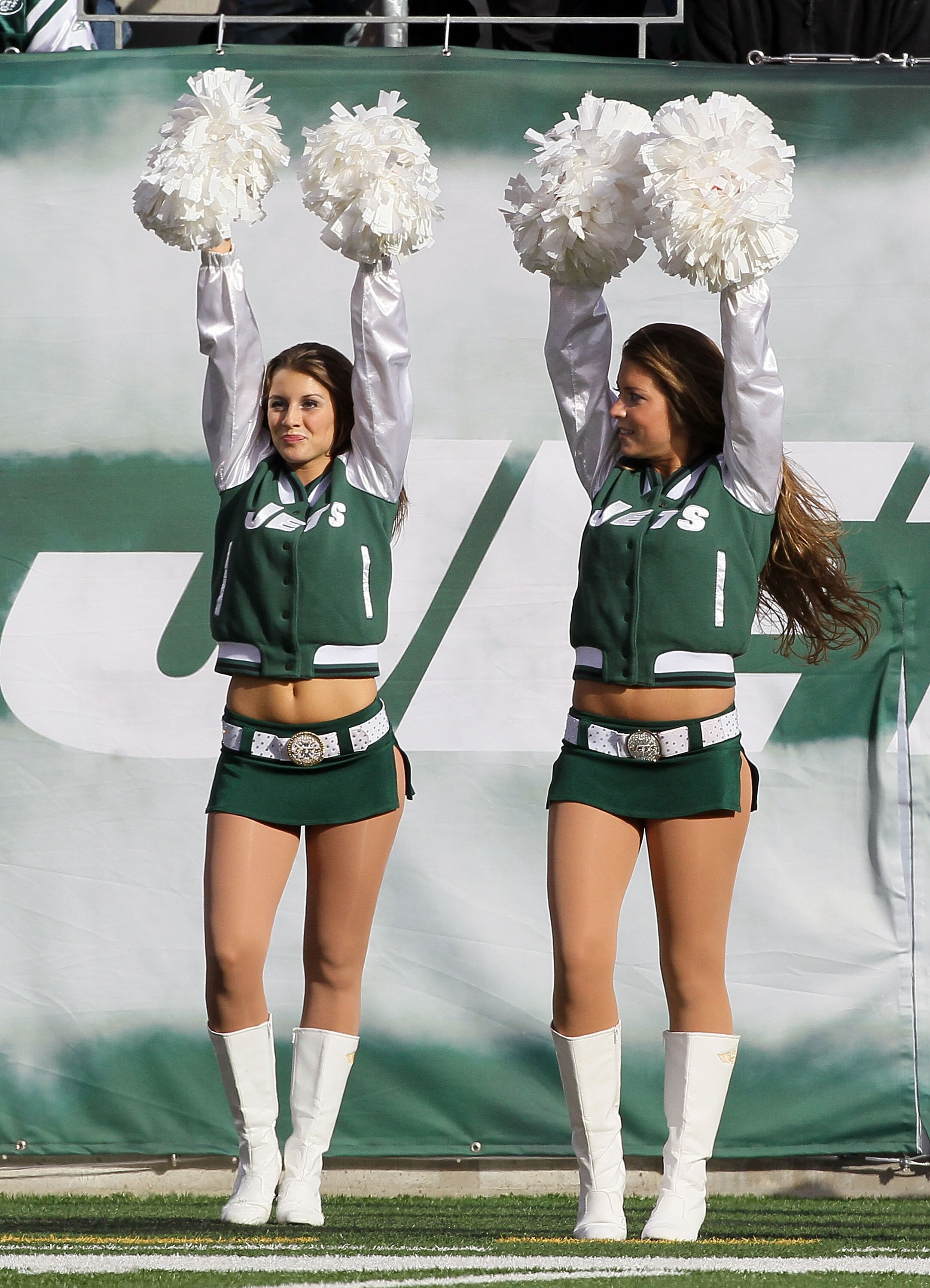 EAST RUTHERFORD, NJ - NOVEMBER 21: Cheerleaders of the New York Jets perform against the Houston Texans on November 21, 2010 at the New Meadowlands Stadium in East Rutherford, New Jersey.  (Photo by Jim McIsaac/Getty Images)