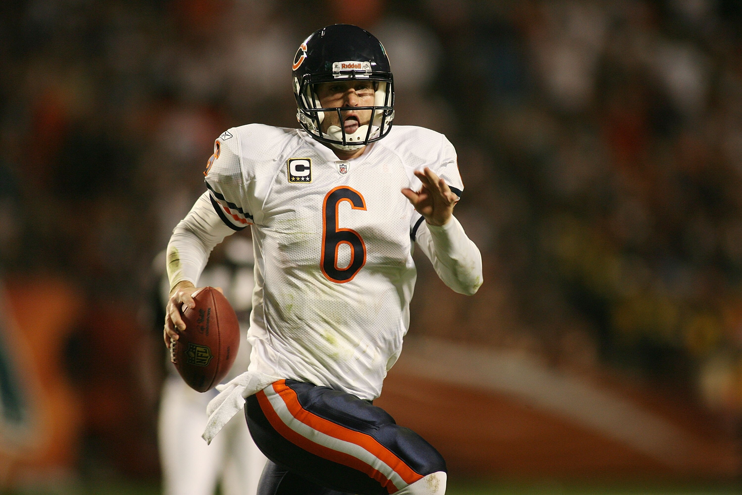 MIAMI - NOVEMBER 18:  Quarterback Jay Cutler #6 of the Chicago Bears scrambles against the Miami Dolphins at Sun Life Stadium on November 18, 2010 in Miami, Florida.  (Photo by Marc Serota/Getty Images)