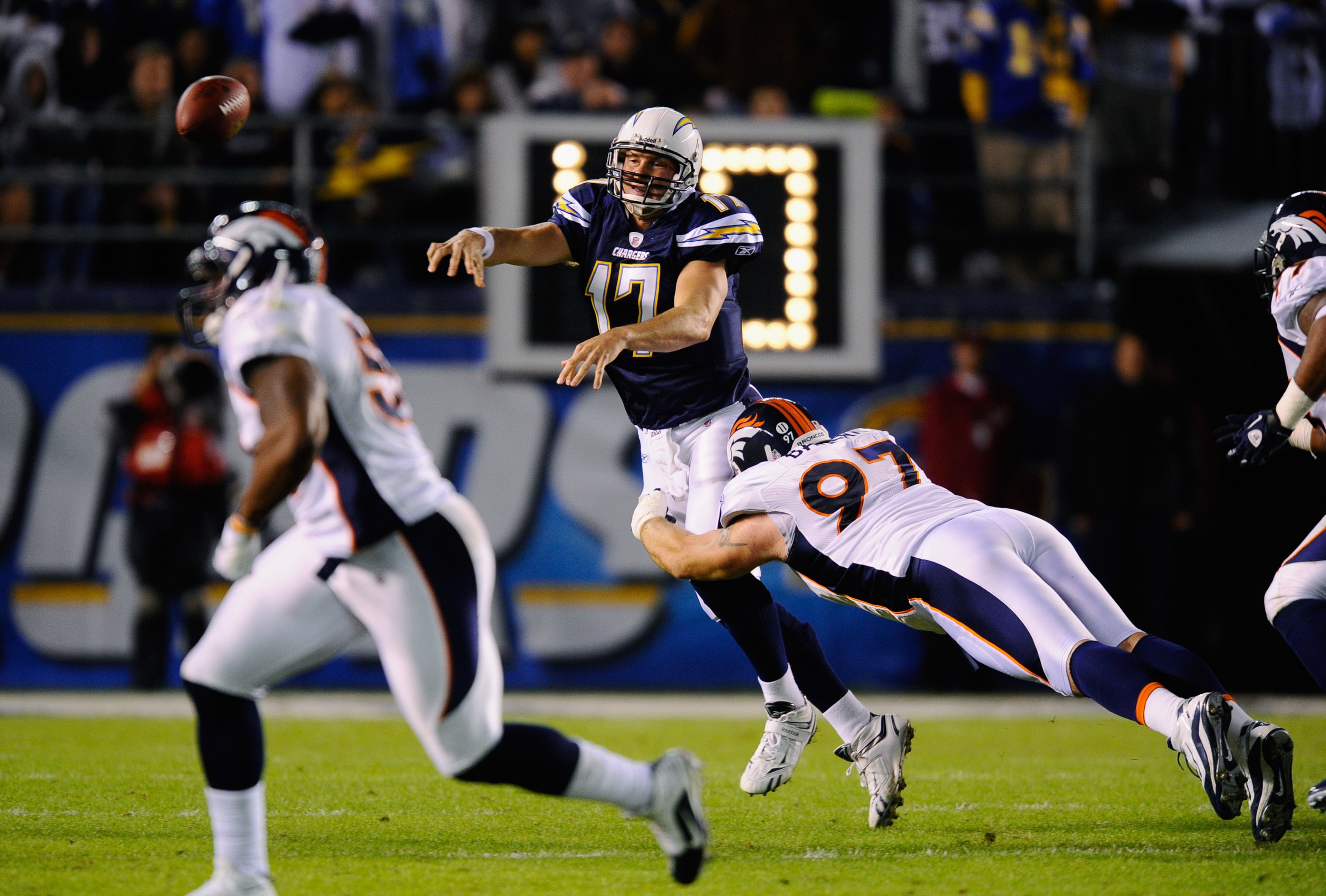 SAN DIEGO - NOVEMBER 22: Quarterback Philip Rivers #17 of the San Diego Chargers throws an incomplete pass under pressure from Justin Bannan #27 of the Denver Broncos at Qualcomm Stadium on November 22, 2010 in San Diego, California. (Photo by Kevork Dj SAN DIEGO - NOVEMBER 22: Quarterback Philip Rivers #17 of the San Diego Chargers throws an incomplete pass under pressure from Justin Bannan #27 of the Denver Broncos at Qualcomm Stadium on November 22, 2010 in San Diego, California. (Photo by Kevork Dj