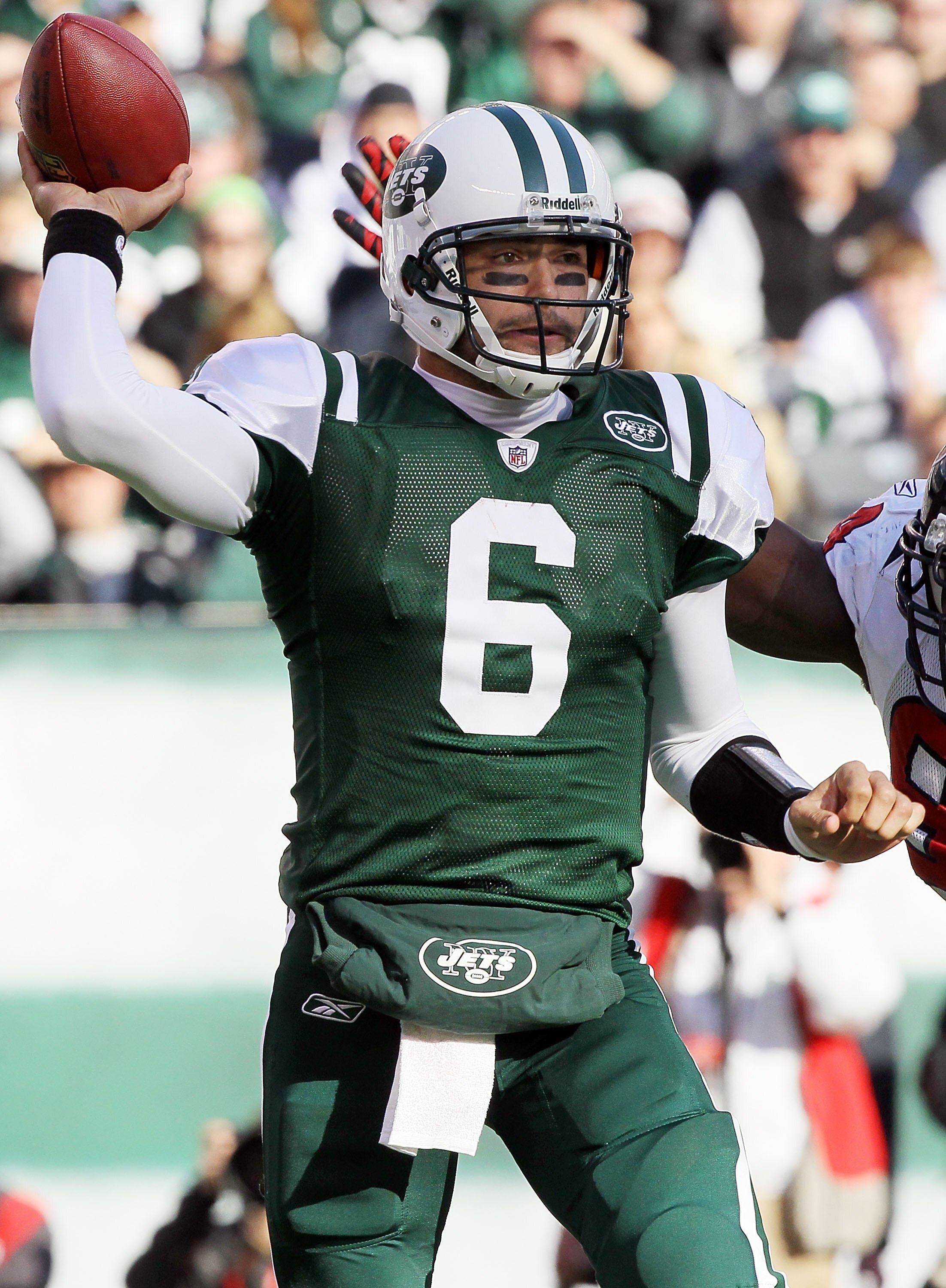 EAST RUTHERFORD, NJ - NOVEMBER 21:  Mark Sanchez #6 of the New York Jets looks to throw a pass against the Houston Texans on November 21, 2010 at the New Meadowlands Stadium in East Rutherford, New Jersey.  (Photo by Jim McIsaac/Getty Images)