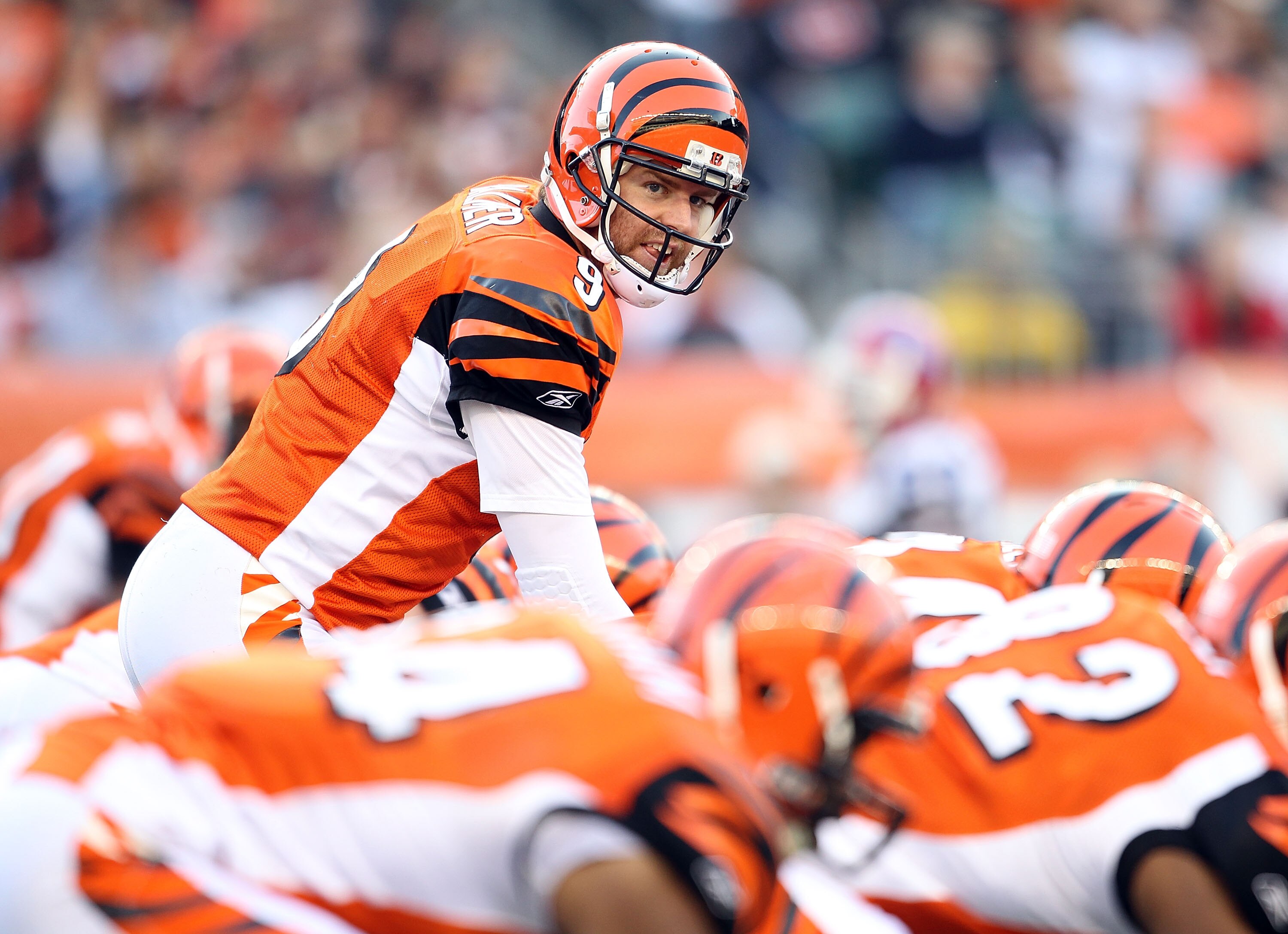 CINCINNATI - NOVEMBER 21:  Carson Palmer #9 of the Cincinnati Bengals gives instructions to his team during the Bengals 49-31 loss to the Buffalo Bills at Paul Brown Stadium on November 21, 2010 in Cincinnati, Ohio.  (Photo by Andy Lyons/Getty Images)