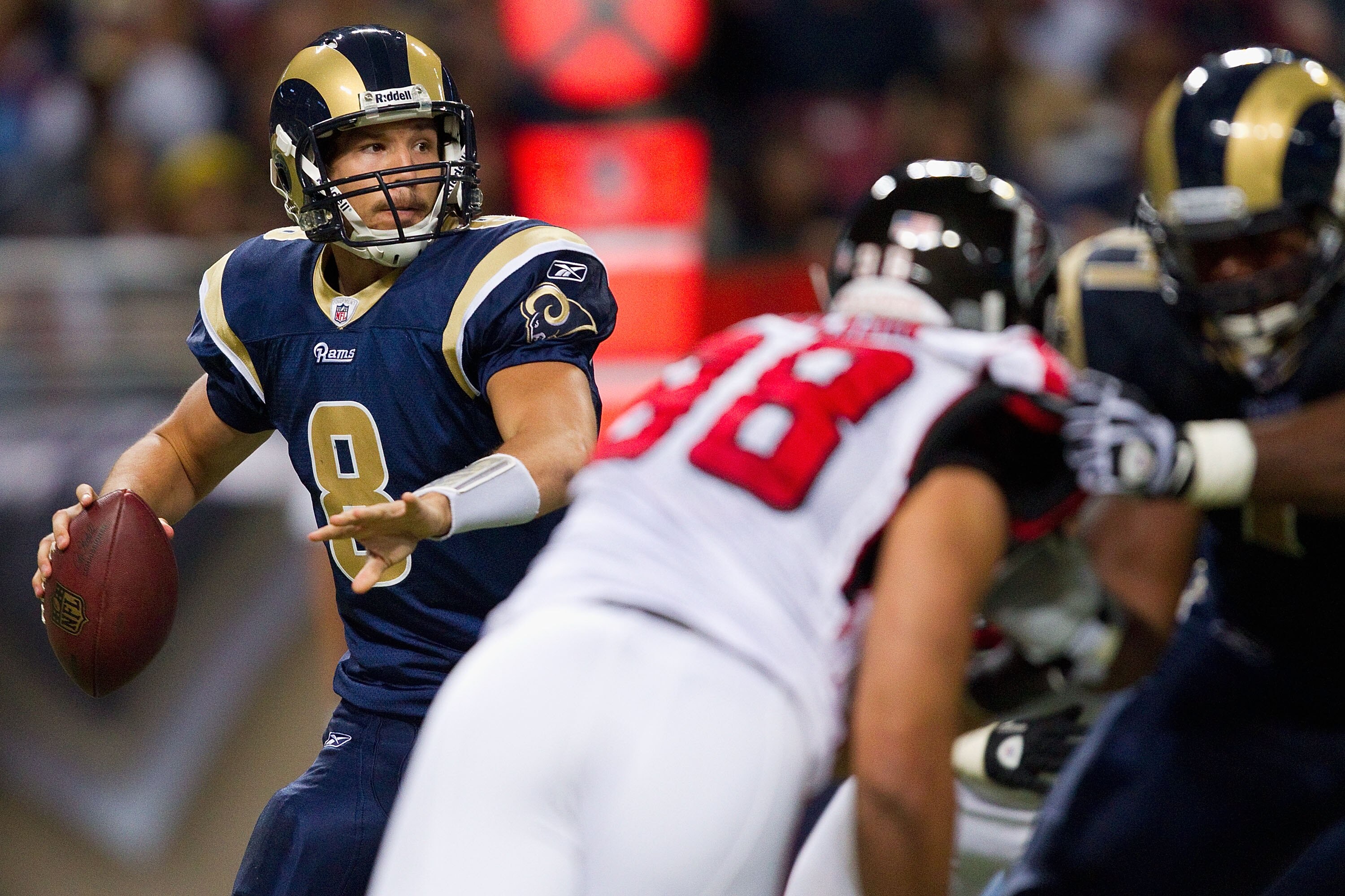 ST. LOUIS - NOVEMBER 21: Sam Bradford #8 of the St. Louis Rams passes against the Atlanta Falcons at the Edward Jones Dome on November 21, 2010 in St. Louis, Missouri.  The Falcons beat the Rams 34-17.  (Photo by Dilip Vishwanat/Getty Images)