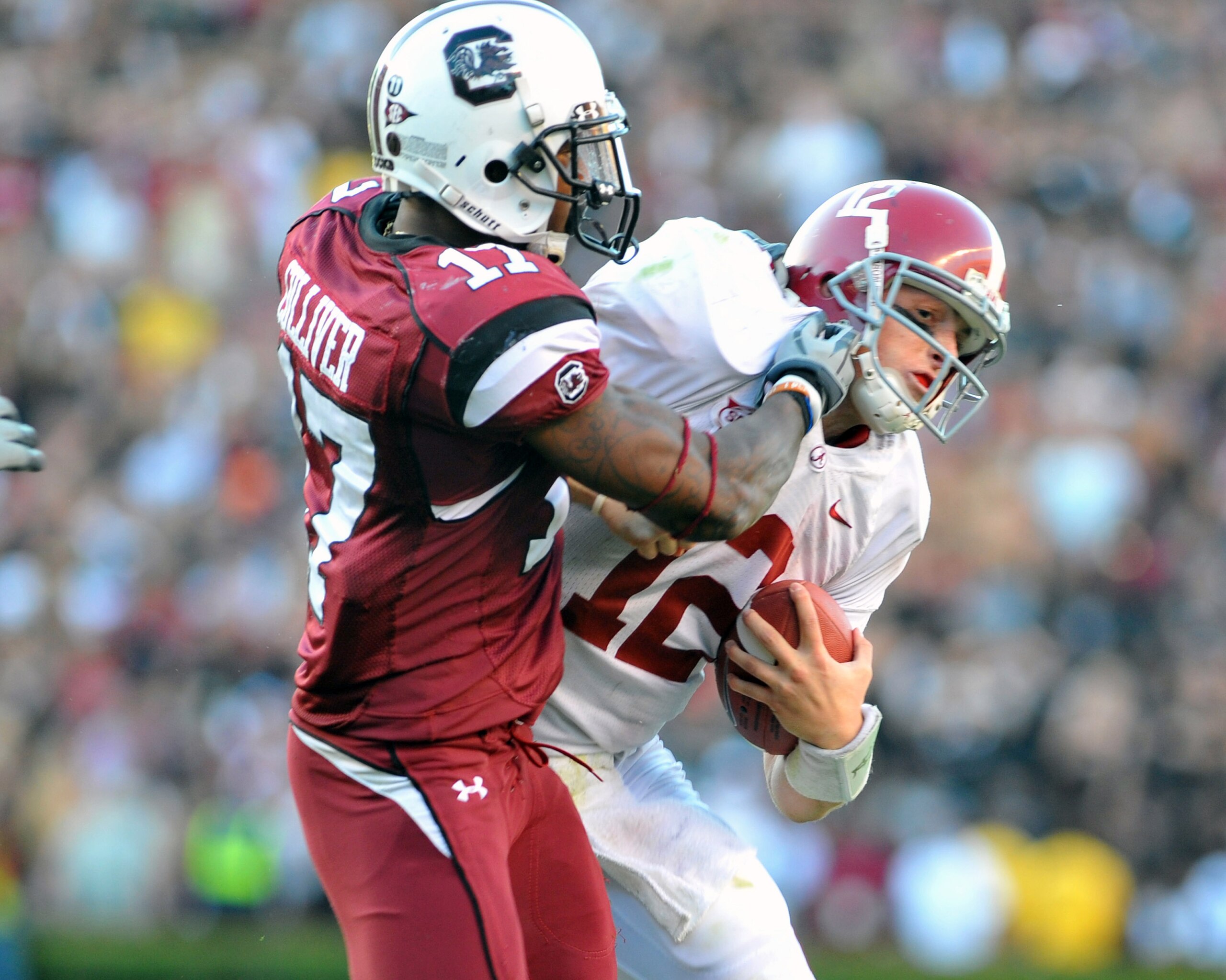 COLUMBIA, SC - OCTOBER 9: Defensive back Chris Culliver #17 of the Carolina Gamecocks tackles quarterback Greg McElroy of the Alabama Crimson Tide October 9, 2010 at Williams-Brice Stadium in Columbia, South Carolina.  (Photo by Al Messerschmidt/Getty Ima