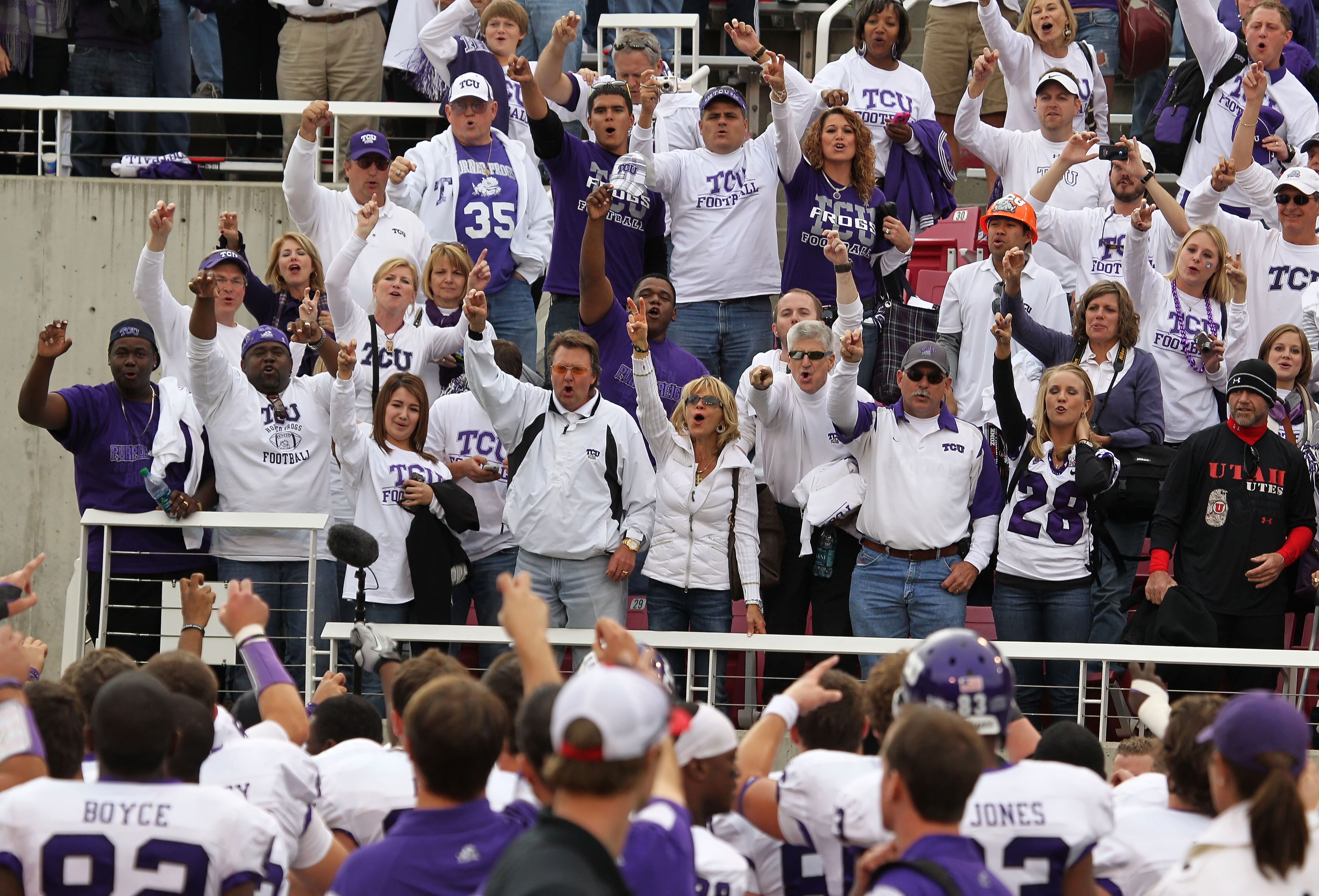 SALT LAKE CITY, UT - NOVEMBER 6: Fans of the TCU Horned Frogs cheer their team after a game against the Utah Utes during the second half of an NCAA Football game November 6, 2010 at Rice-Eccles Stadium in Salt Lake City, Utah. TCU Beat Utah 47-7.  (Photo